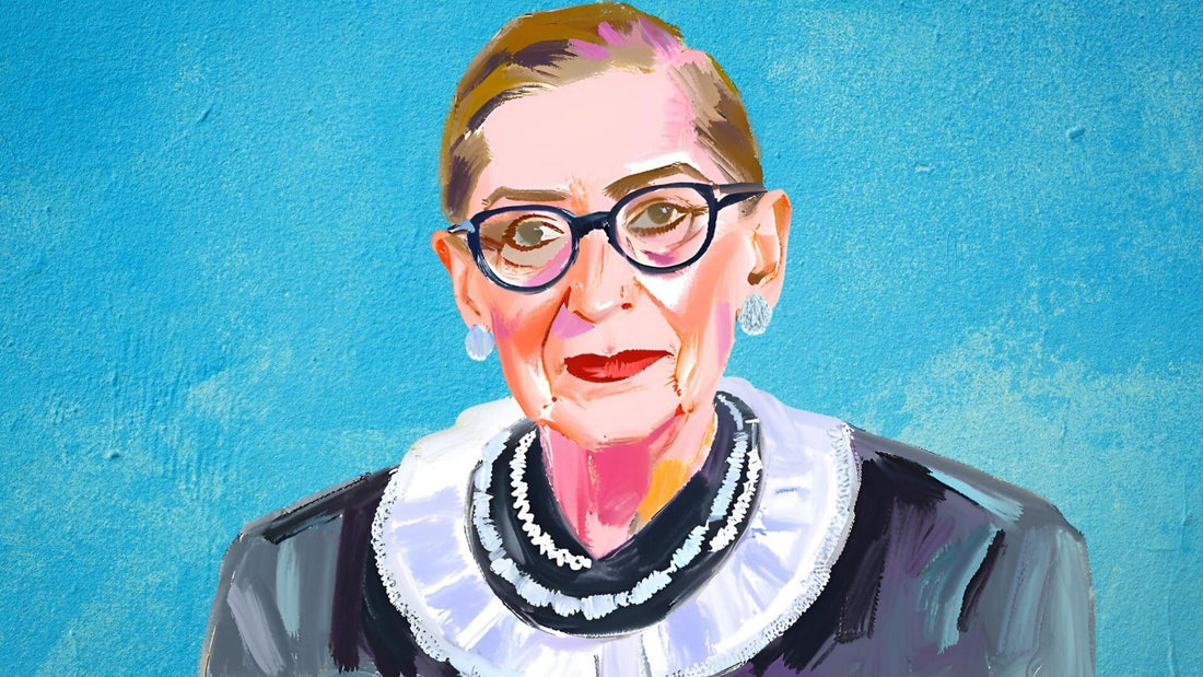Portrait of a woman wearing oversized statement glasses, necklaces and bold jewellery