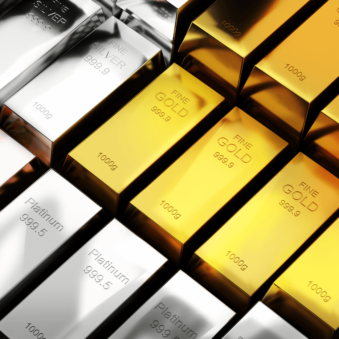 Gold and silver bars displayed side by side, comparing metals used in jewellery