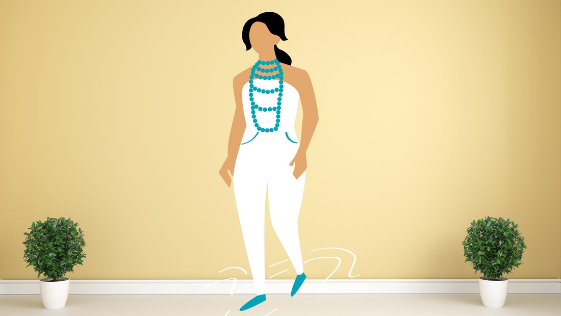 Illustration of a woman in a blue dress wearing a pendant necklace, depicting necklace length and fit