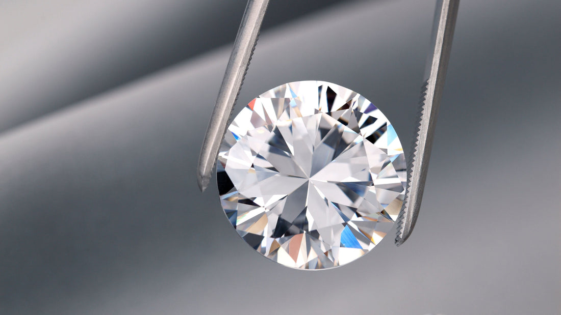 Macro photograph of a faceted colourless diamond, highlighting the crown and pavilion