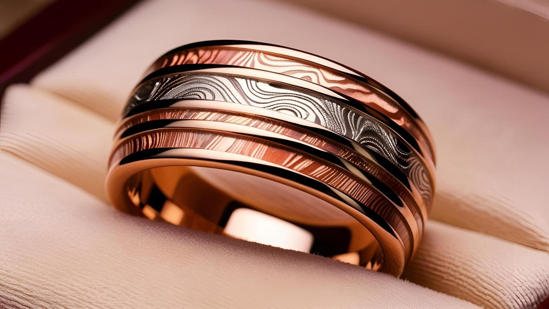 Close-up of layered Japanese mokume-gane rings showing swirling, wood-grain metal patterns