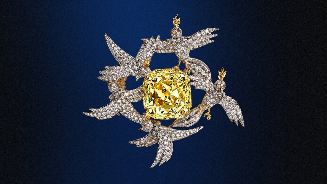 The Tiffany Diamond showcased in an intricate white diamond necklace on a dark background