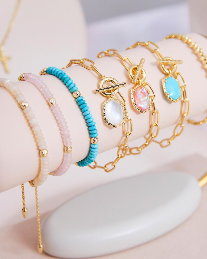 daphne-gold-link-and-chain-bracelet-in-light-pink-iridescent-kendra-scott