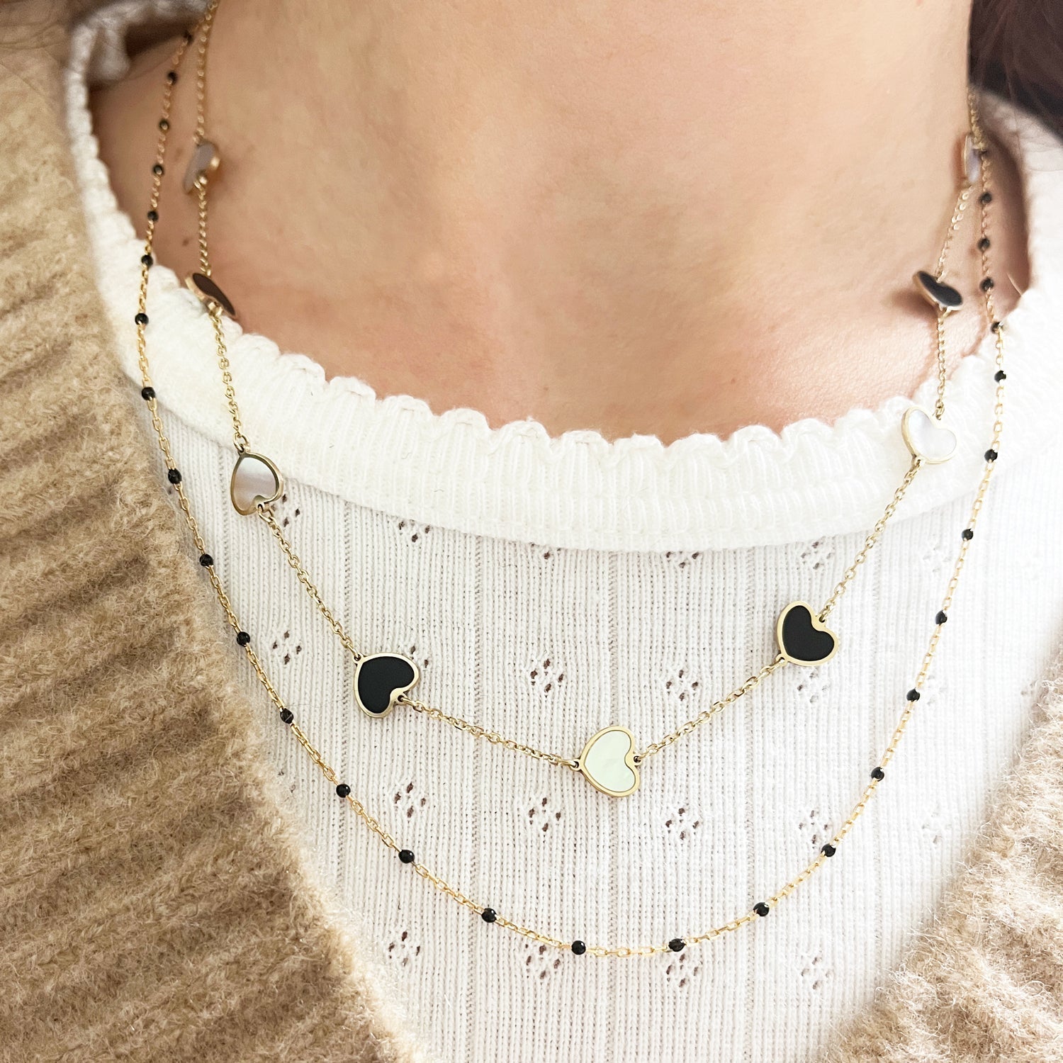 Mother Of Pearl And Onyx Mixed Heart Station Necklace