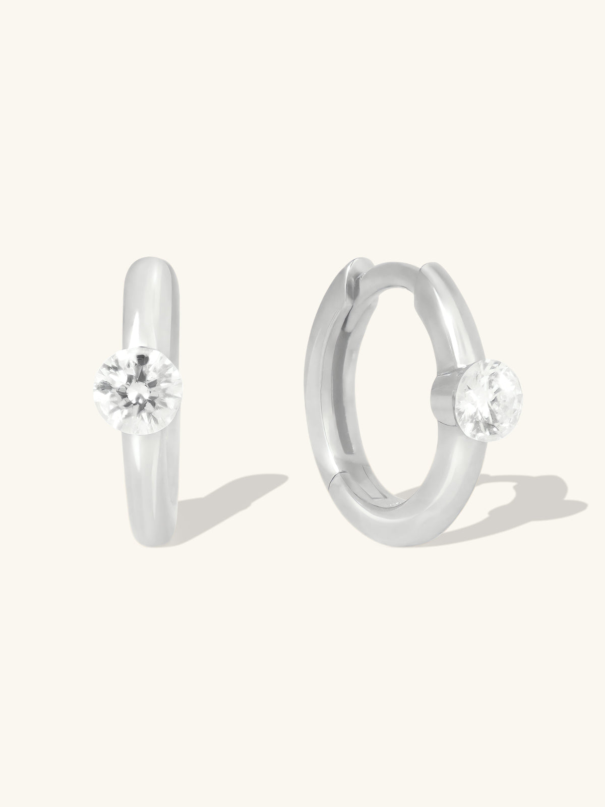 Floating Diamond 14K White Gold 10mm Huggie Earrings