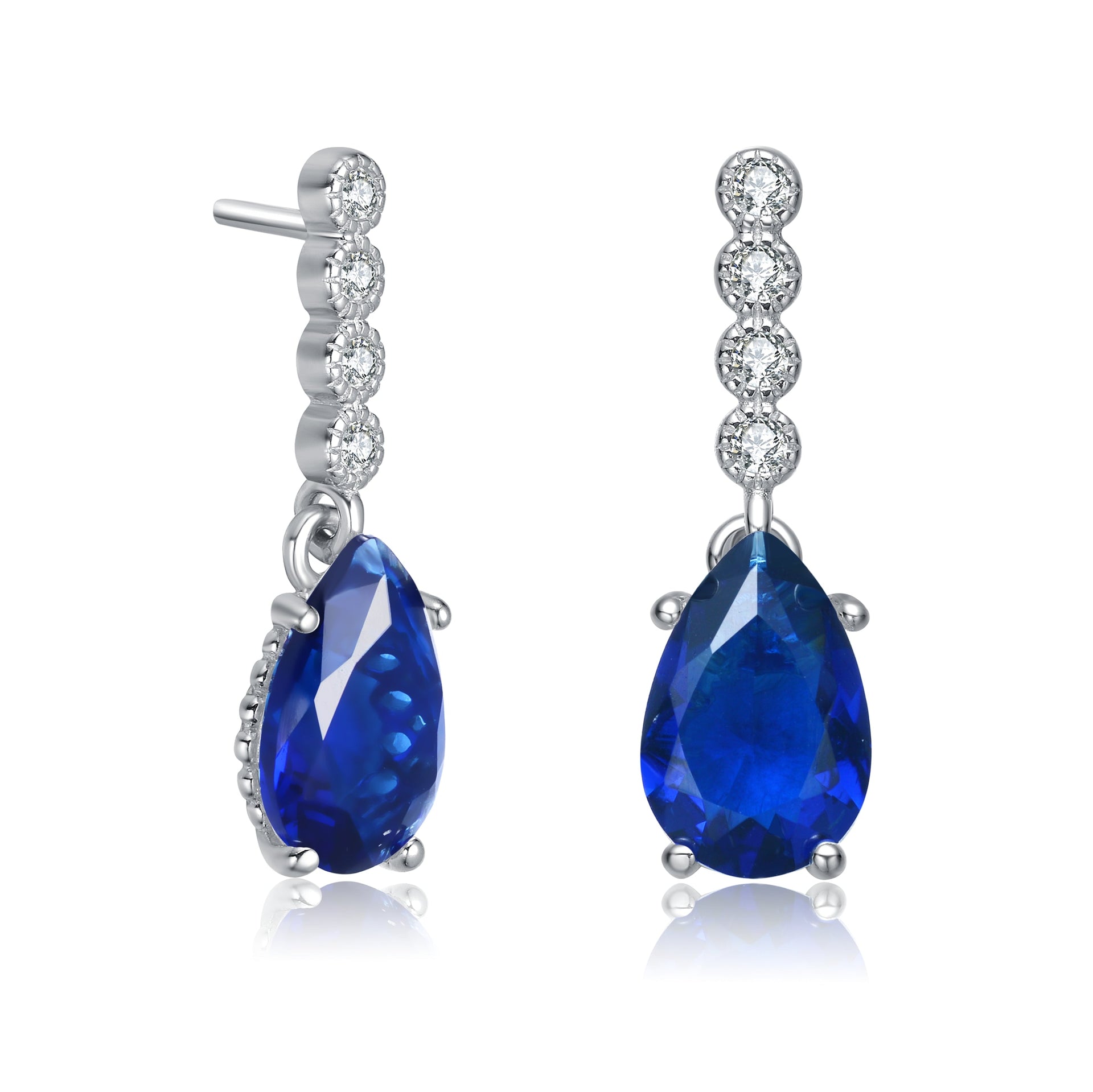 Sterling Silver Rhodium Plated With Sapphire Blue Baguette And Round Cubic Zirconia Stud Earrings