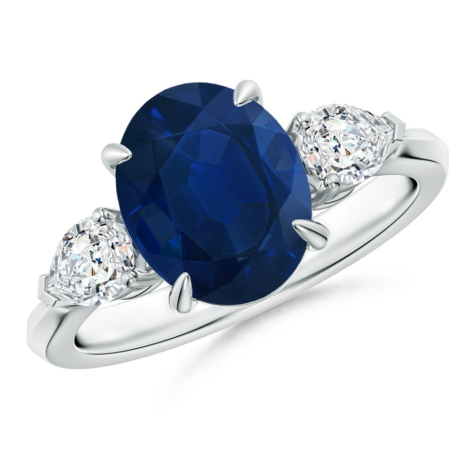 Oval Blue Sapphire and Pear Diamond Three Stone Engagement Ring