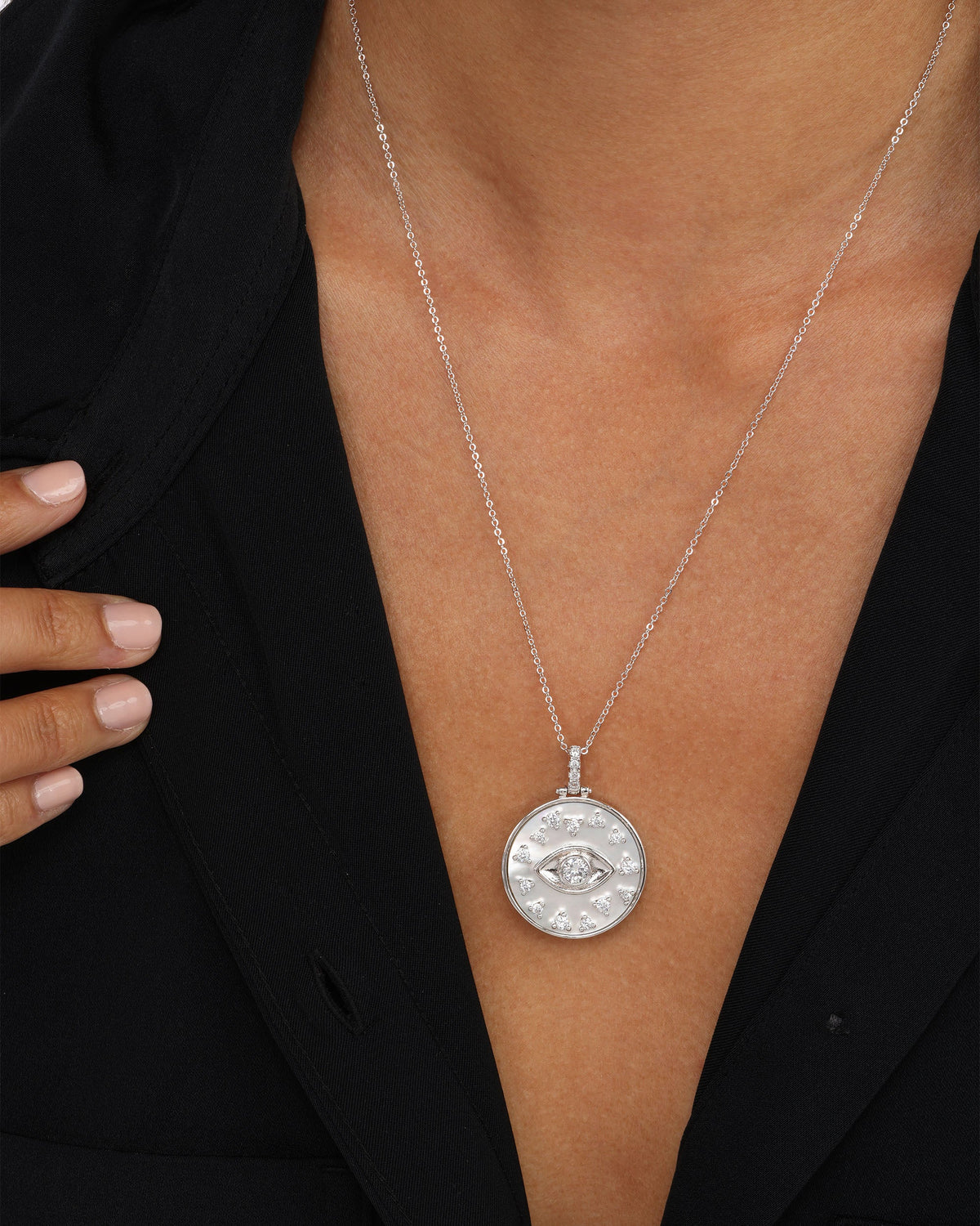 evil-eye-medallion-necklace-in-silver-and-white-diamondettes