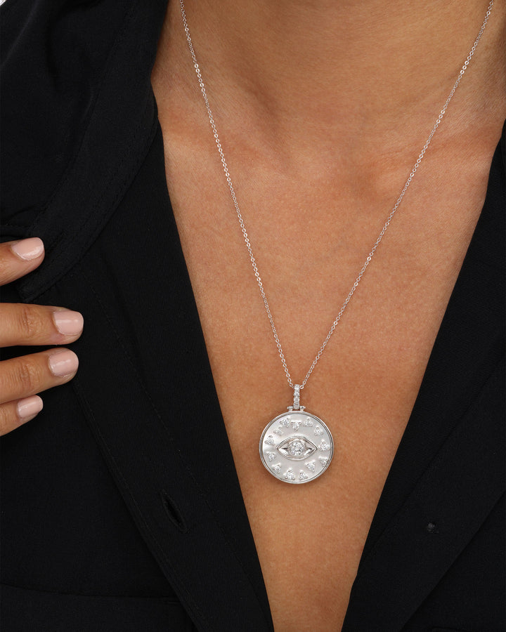 evil-eye-medallion-necklace-in-silver-and-white-diamondettes