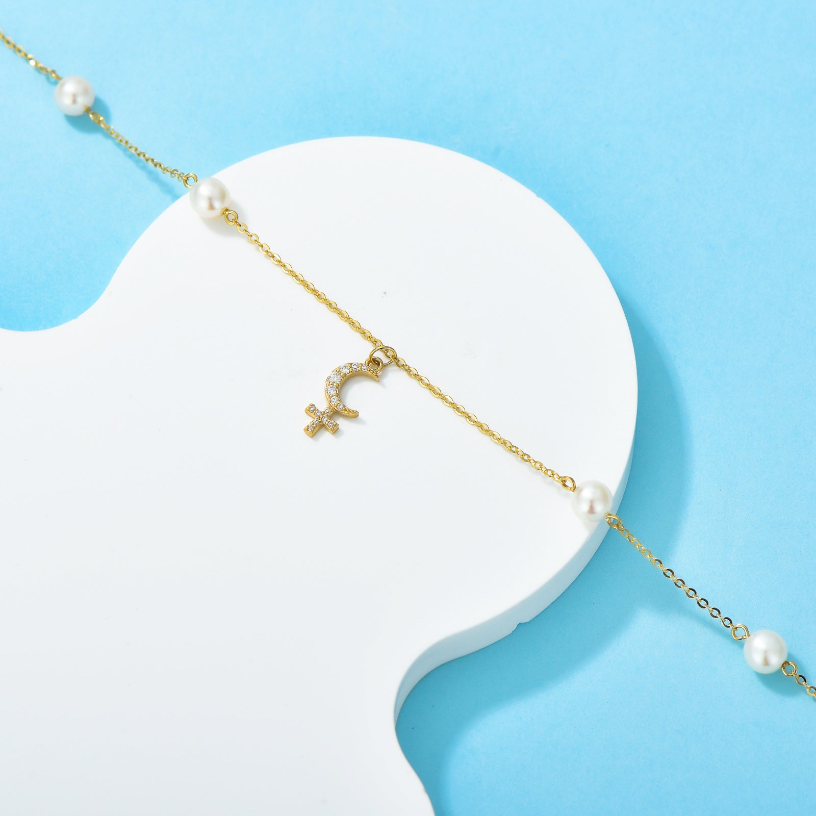 14K Gold Circular Shaped Cubic Zirconia Cross & Moon Charm Bracelet