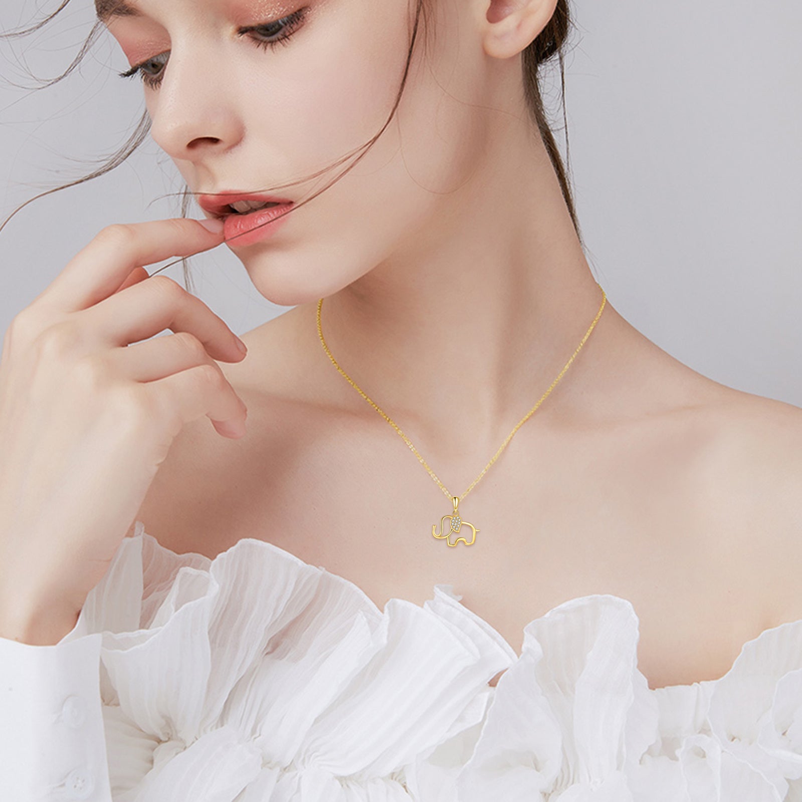 14K Gold Circular Shaped Cubic Zirconia Elephant Pendant Necklace