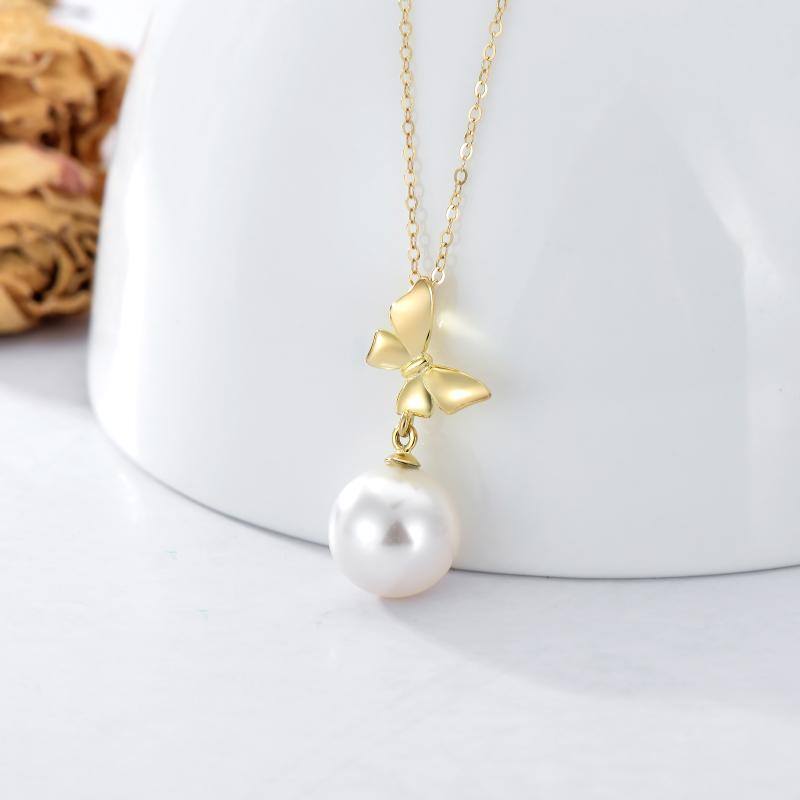 14K Gold Circular Shaped Pearl Bow Pendant Necklace