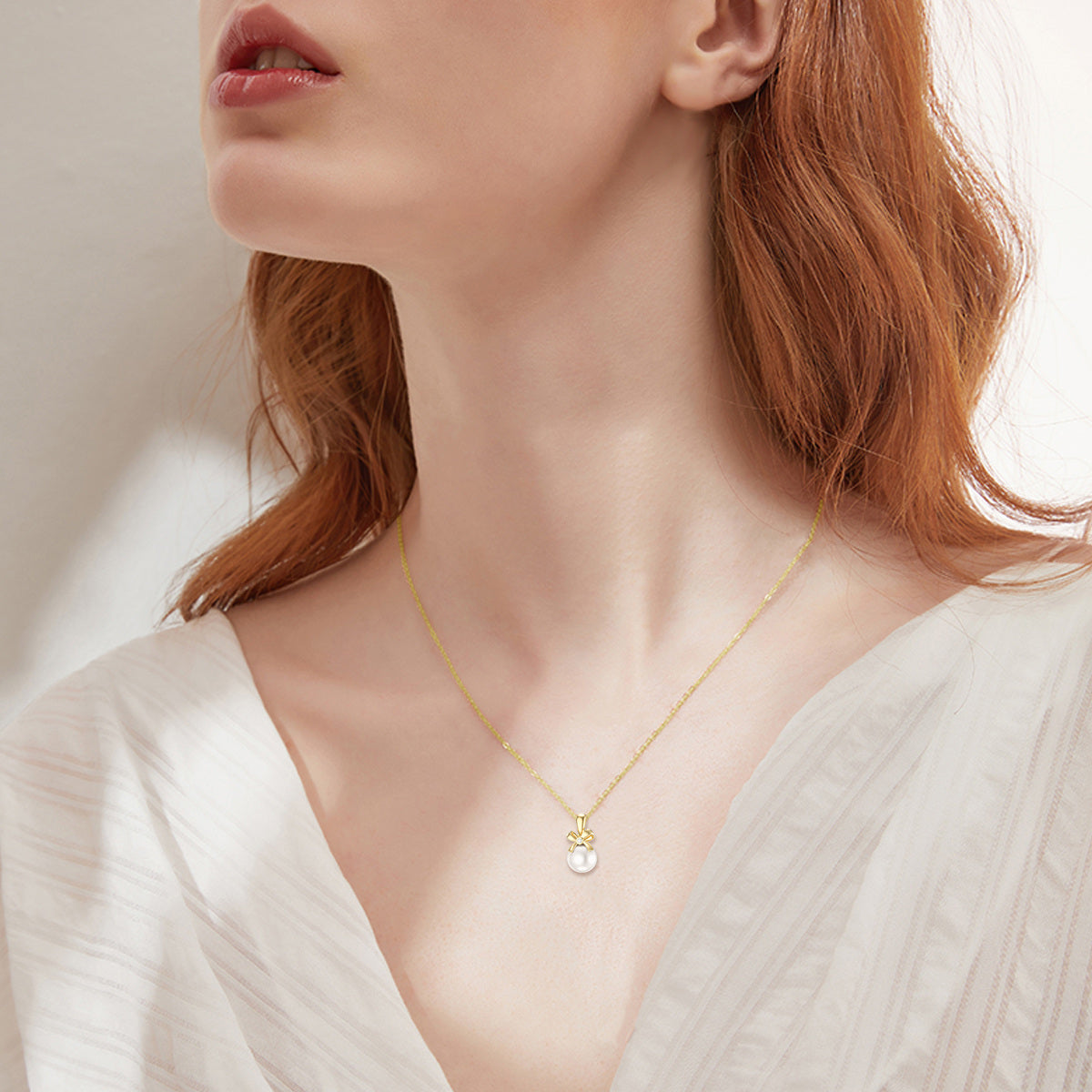14K Gold Circular Shaped Pearl Bowknot Pendant Necklace
