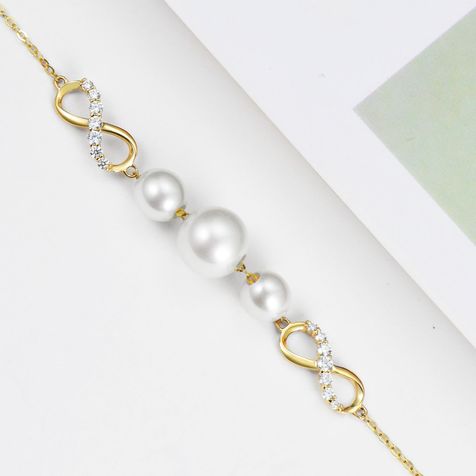 14K Gold Moissanite & Pearl Infinity Symbol Charm Bracelet