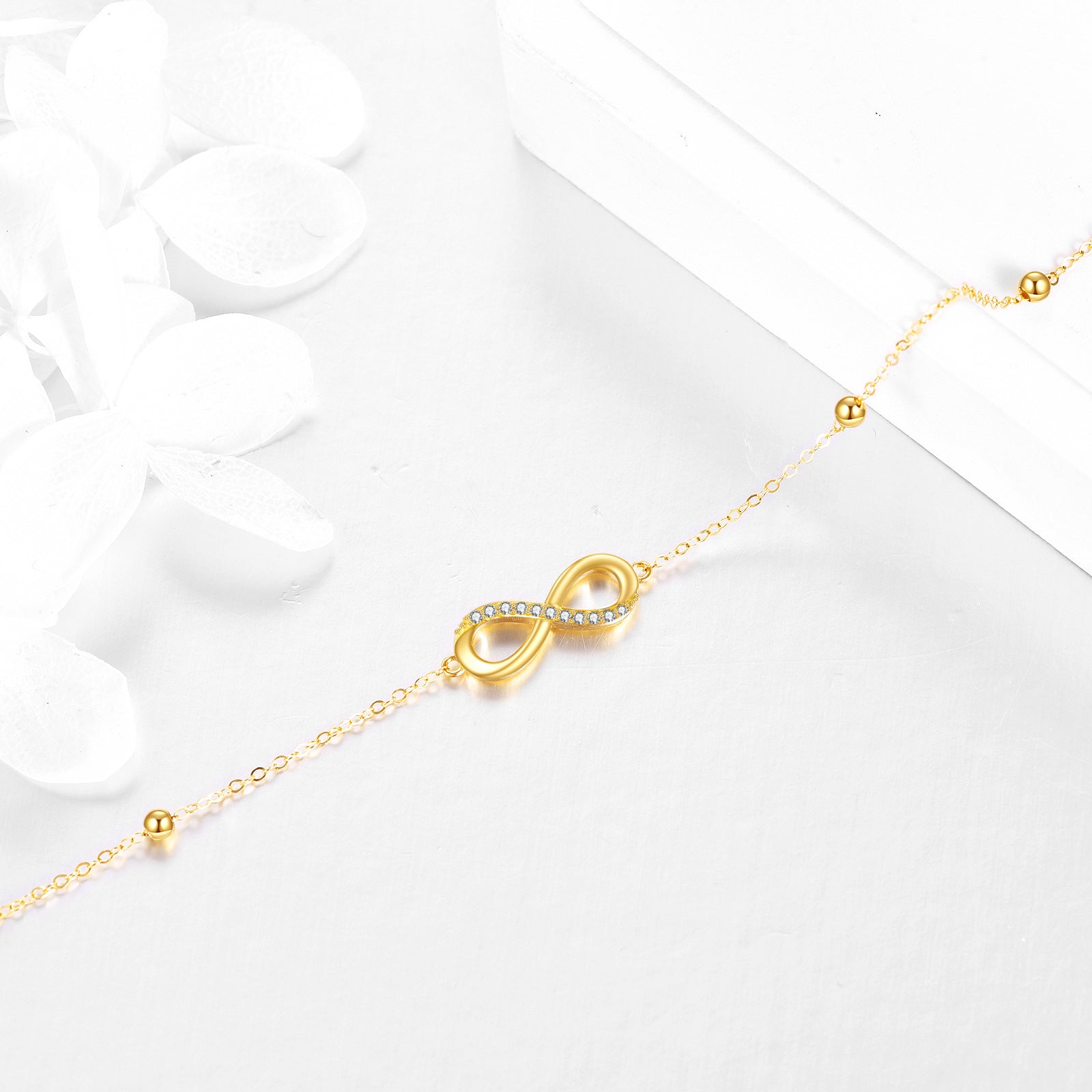 14K Yellow Gold Circular Cubic Zirconia Infinity Symbol Charm Bracelet