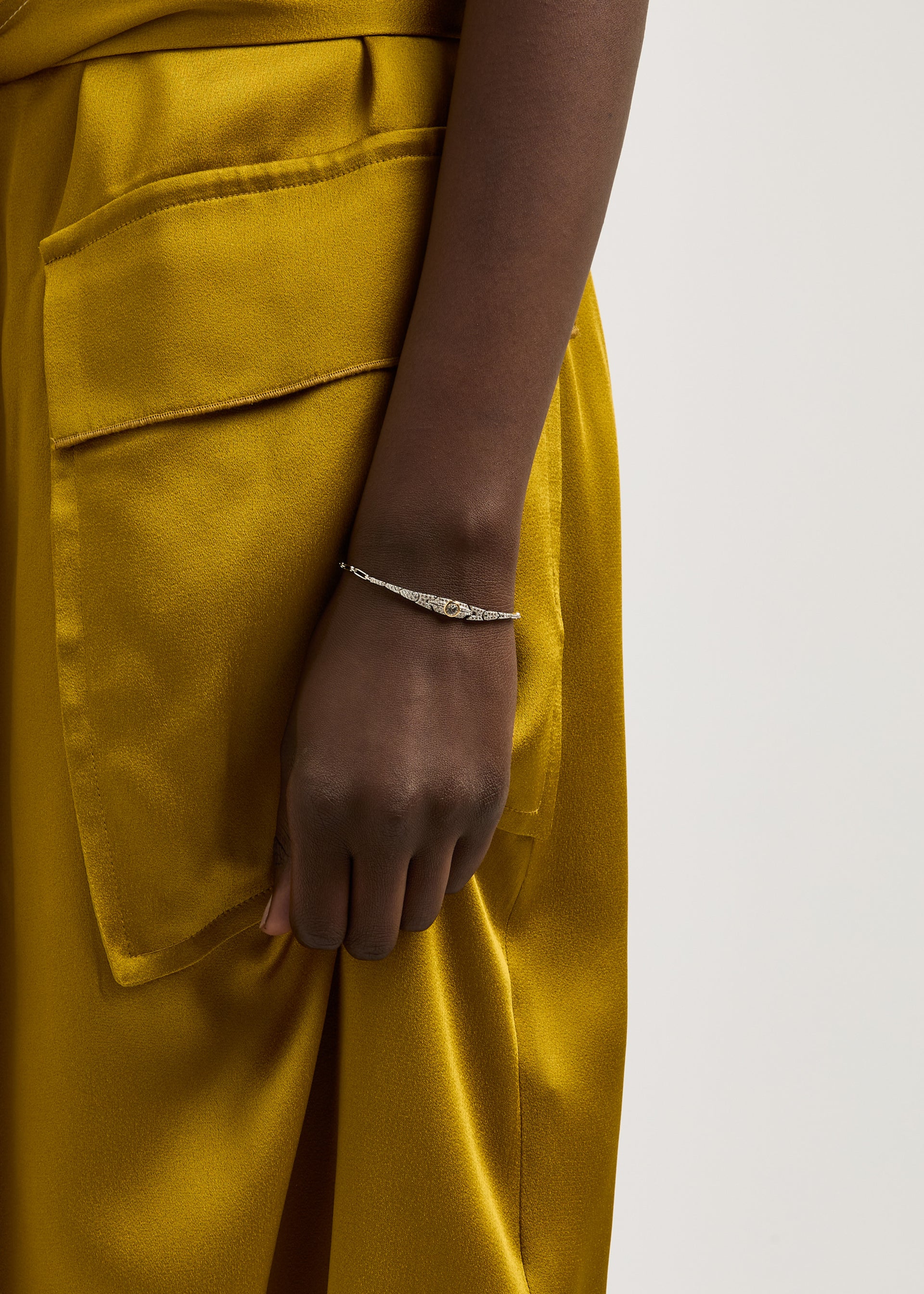 Crystal-embellished rhodium-plated bracelet