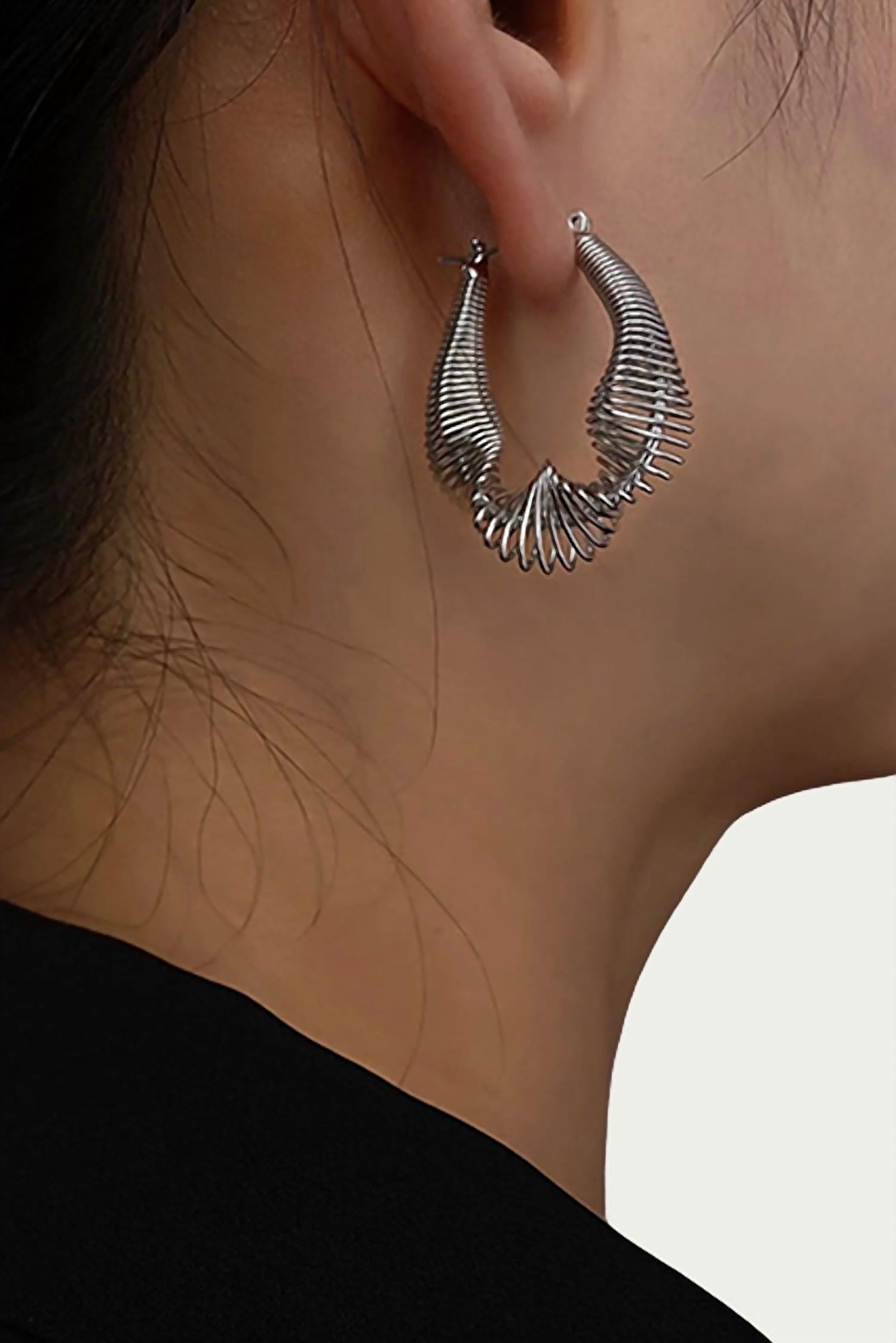 Metropolis Twisted Hoop Earrings In Silver