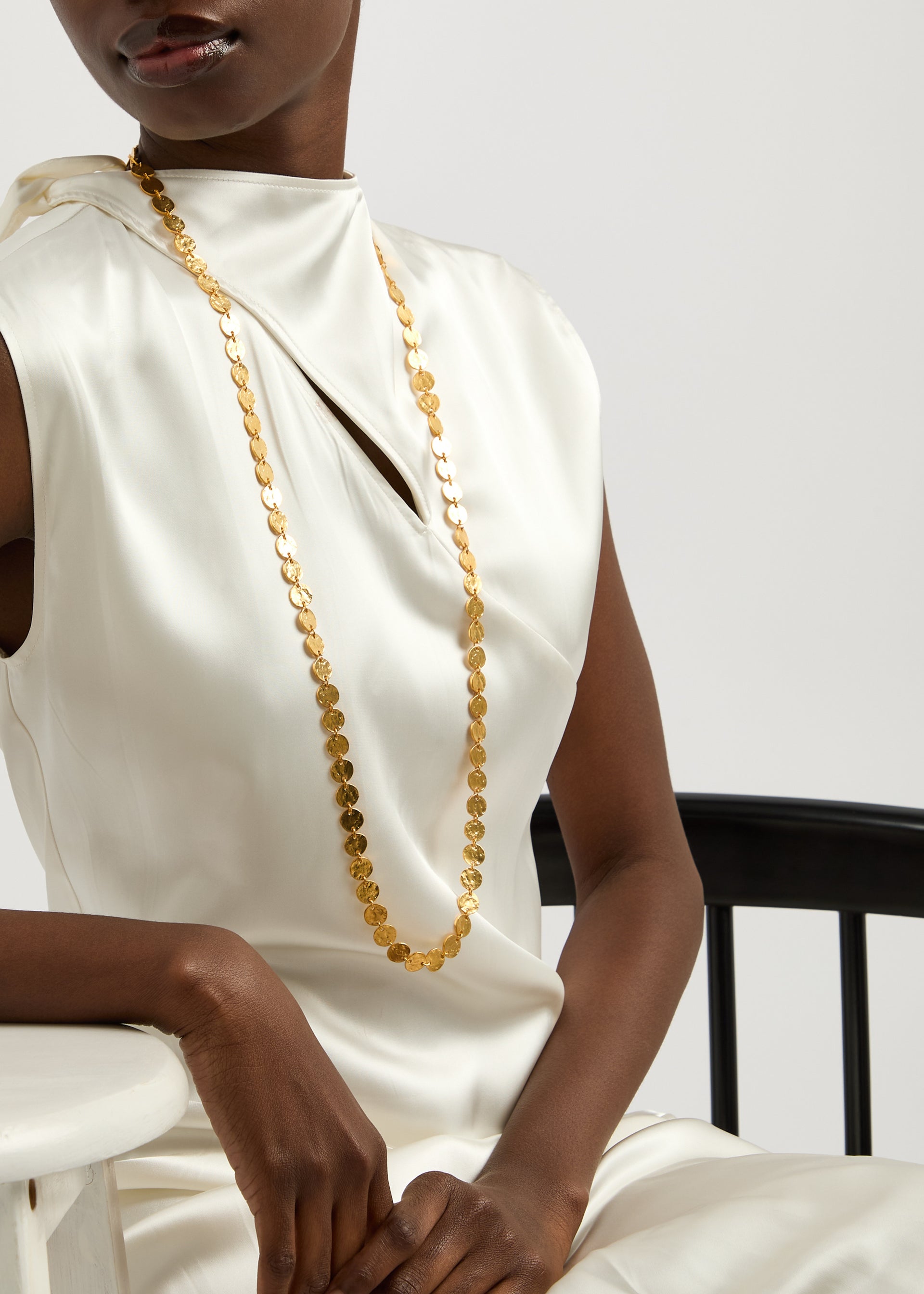 Molten coin necklace