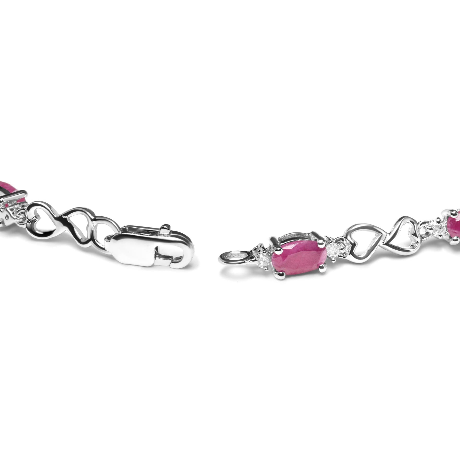 .925 Sterling Silver Pink Oval Shaped Ruby and 1/4 Cttw Diamond 7.25' Link Bracelet (I-J Color, I2-I3 Clarity)