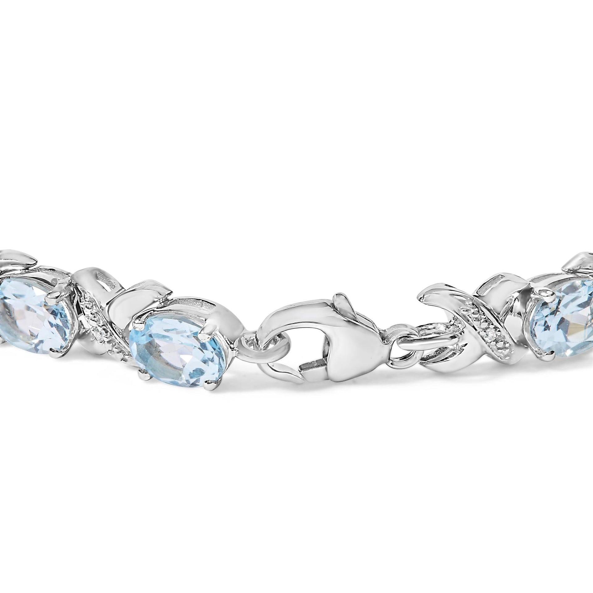 .925 Sterling Silver 16.0 Cttw Oval Blue Topaz and Diamond Accent Tennis X Link Bracelet (I-J Color, I1-I2 Clarity) - Size 7' Inch