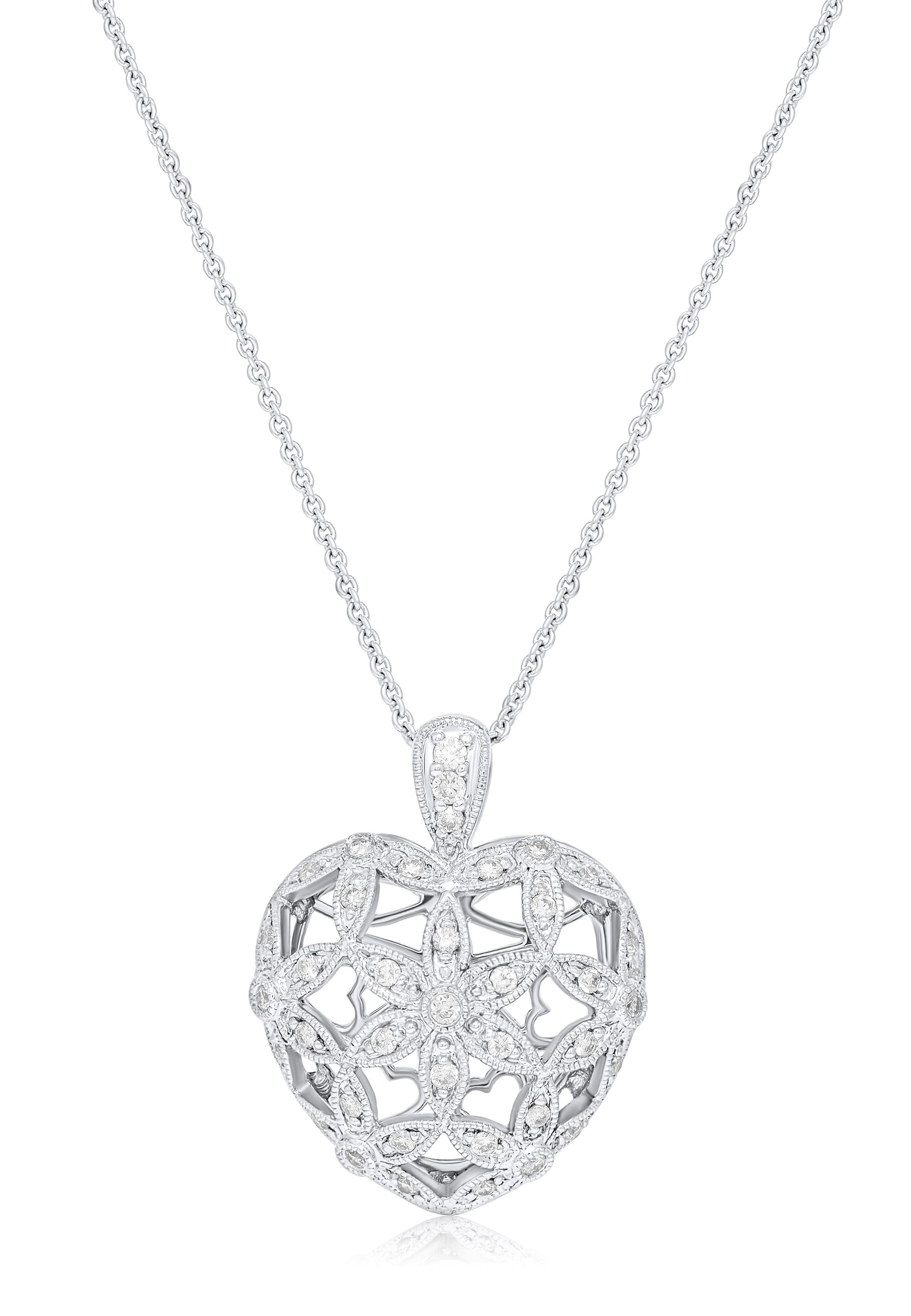 18kt white gold heart shaped pendant with flower design featuring 1.20 cts of diamonds