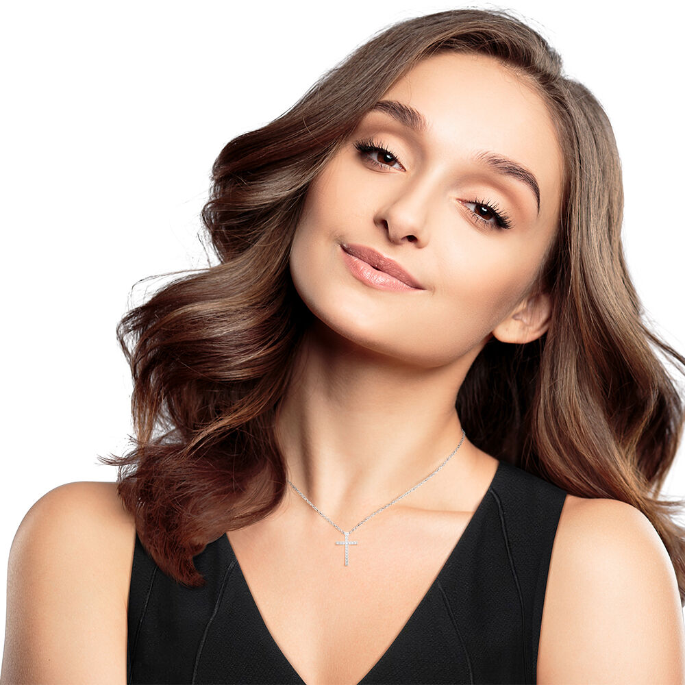 Diamond Cross Pendant in Sterling Silver (1/10 ct. tw.)