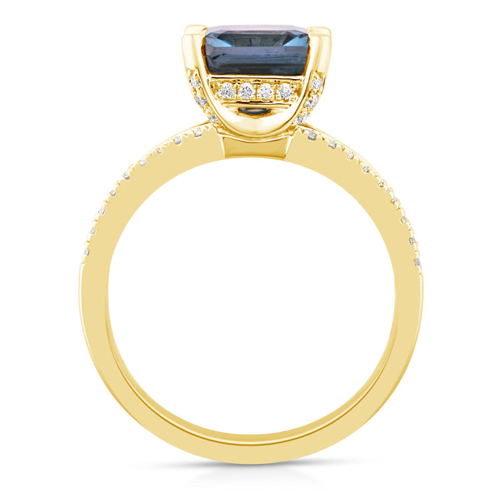 Blue Topaz Ring with Diamonds in 10K Yellow Gold (3/8 ct. tw.)