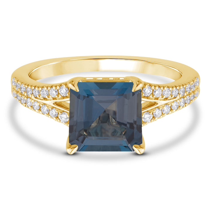 Blue Topaz Ring with Diamonds in 10K Yellow Gold (3/8 ct. tw.)