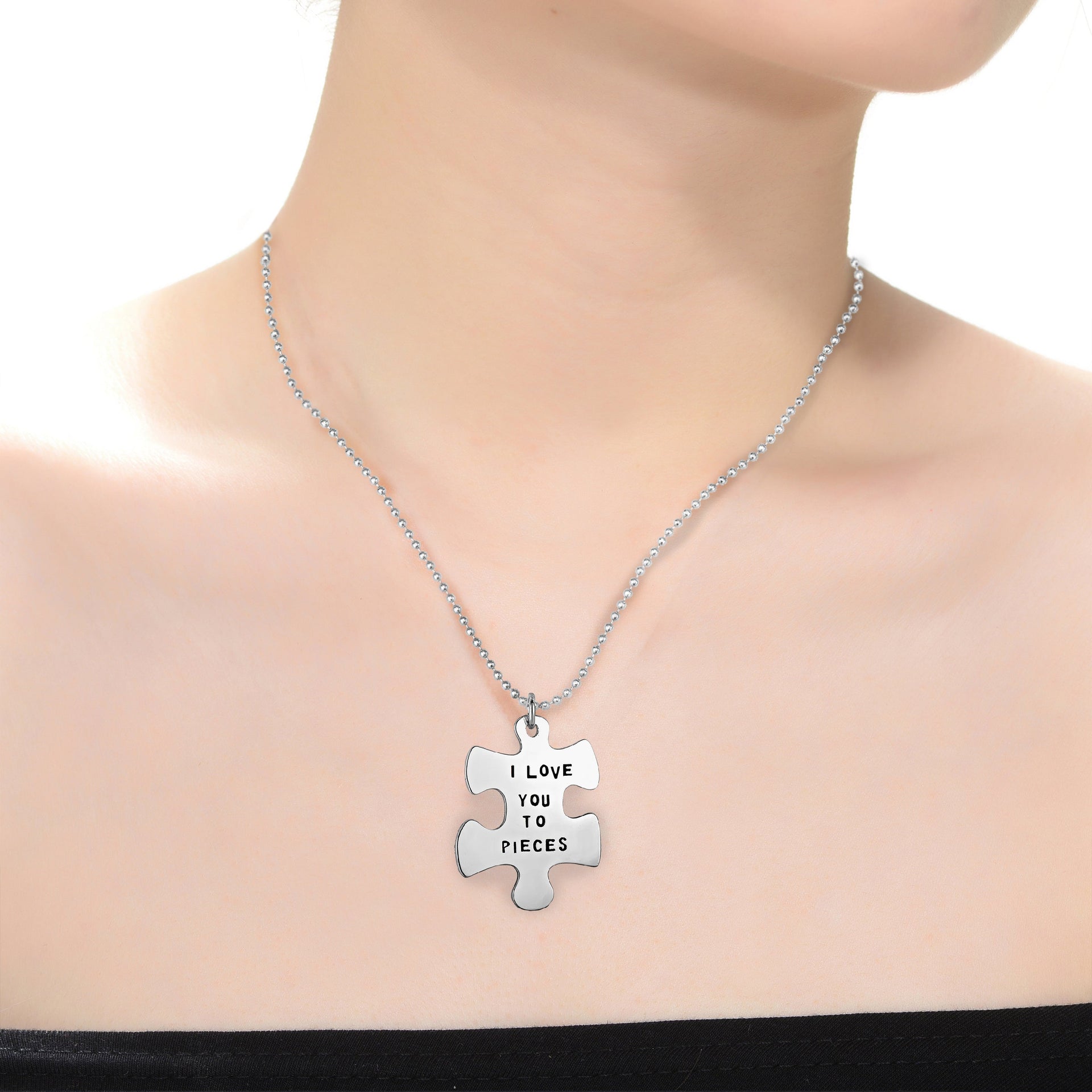 Ra White Gold Plated Puzzle Piece Necklace