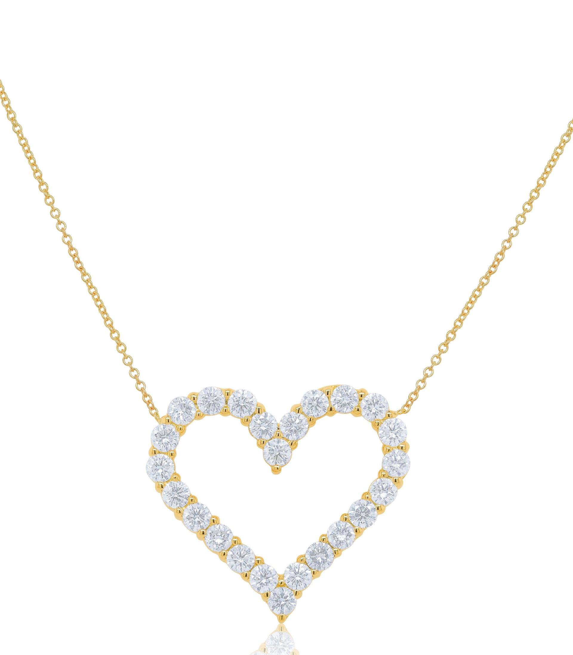 18kt yellow gold open heart pendant featuring 3.55 cts of round diamonds, 24 stones