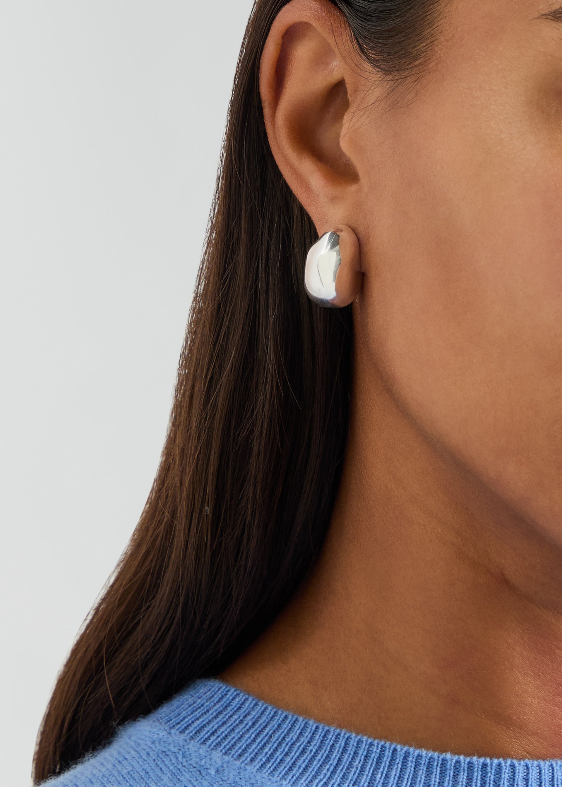 Figure sterling silver hoop earrings