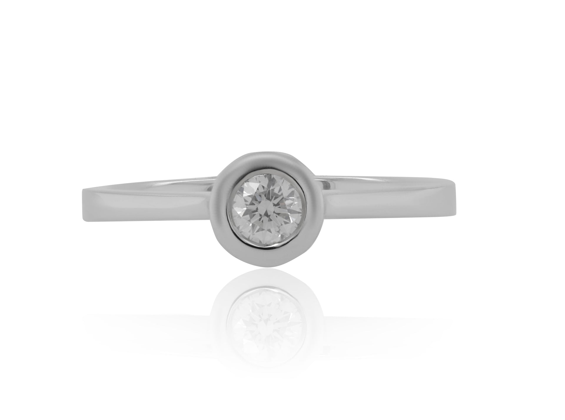 18kt white gold bezel set diamond ring containing 0.25 cts tw (GH VS SI)