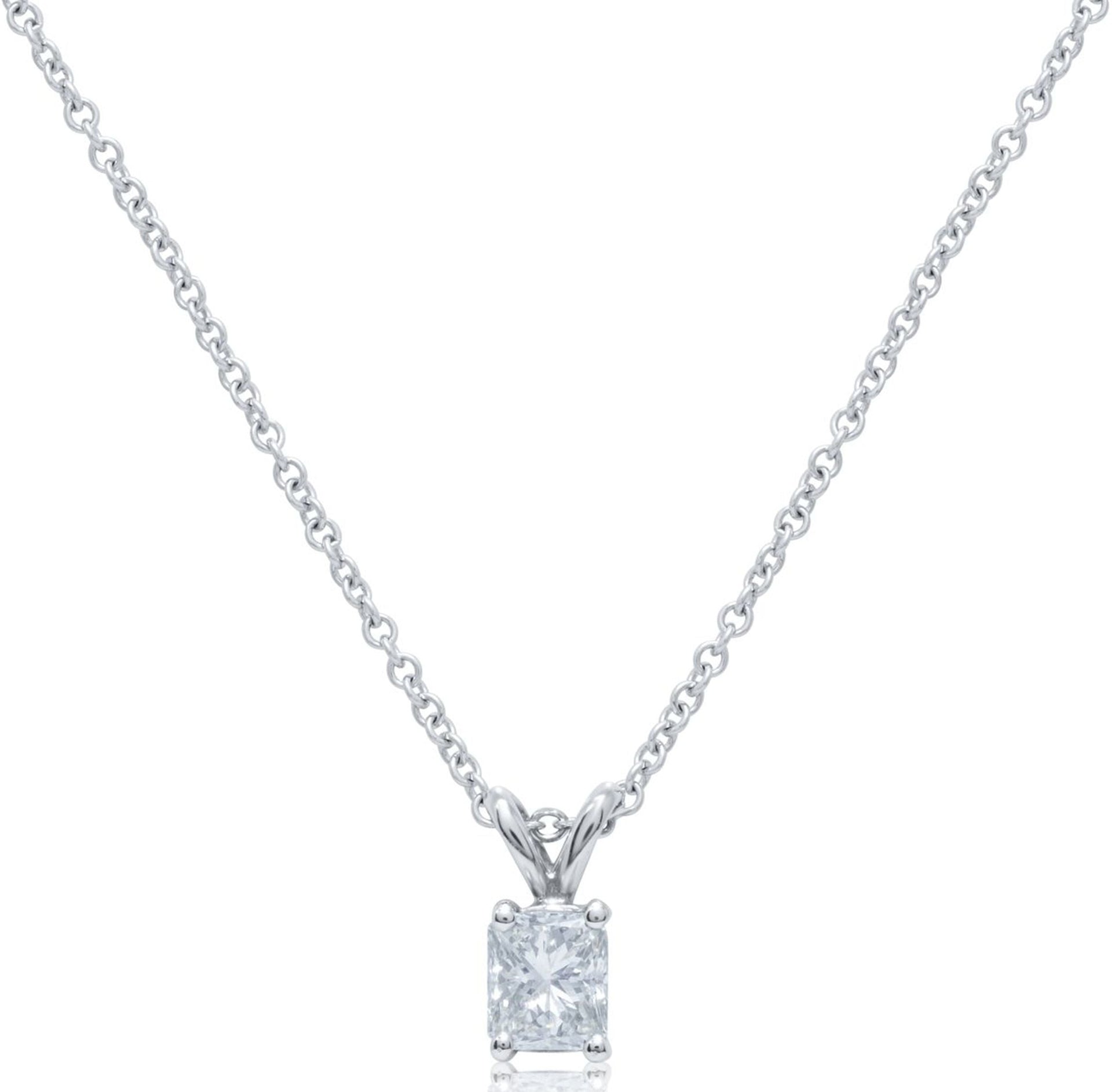 14kt white gold solitaire pendant containing 0.70 ct radiant cut clarity enhanced diamond