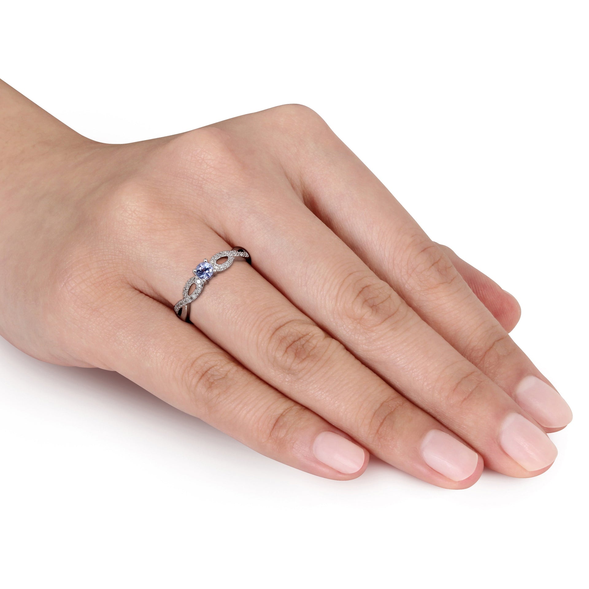 1/6 ct TW Tanzanite and 1/10ct TW Diamond Infinity Ring in Sterling Silver
