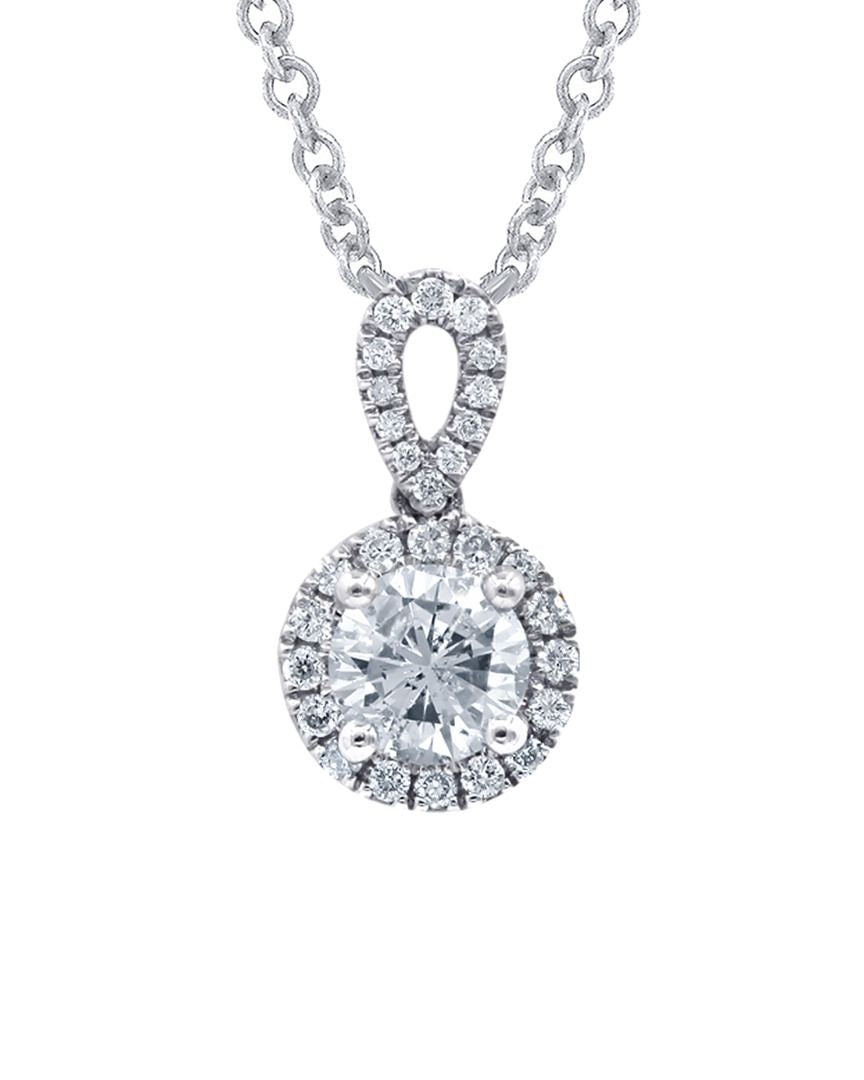 18kt white gold diamond halo pendant featuring 0.51 ct round center and 0.50 cts round diamonds around