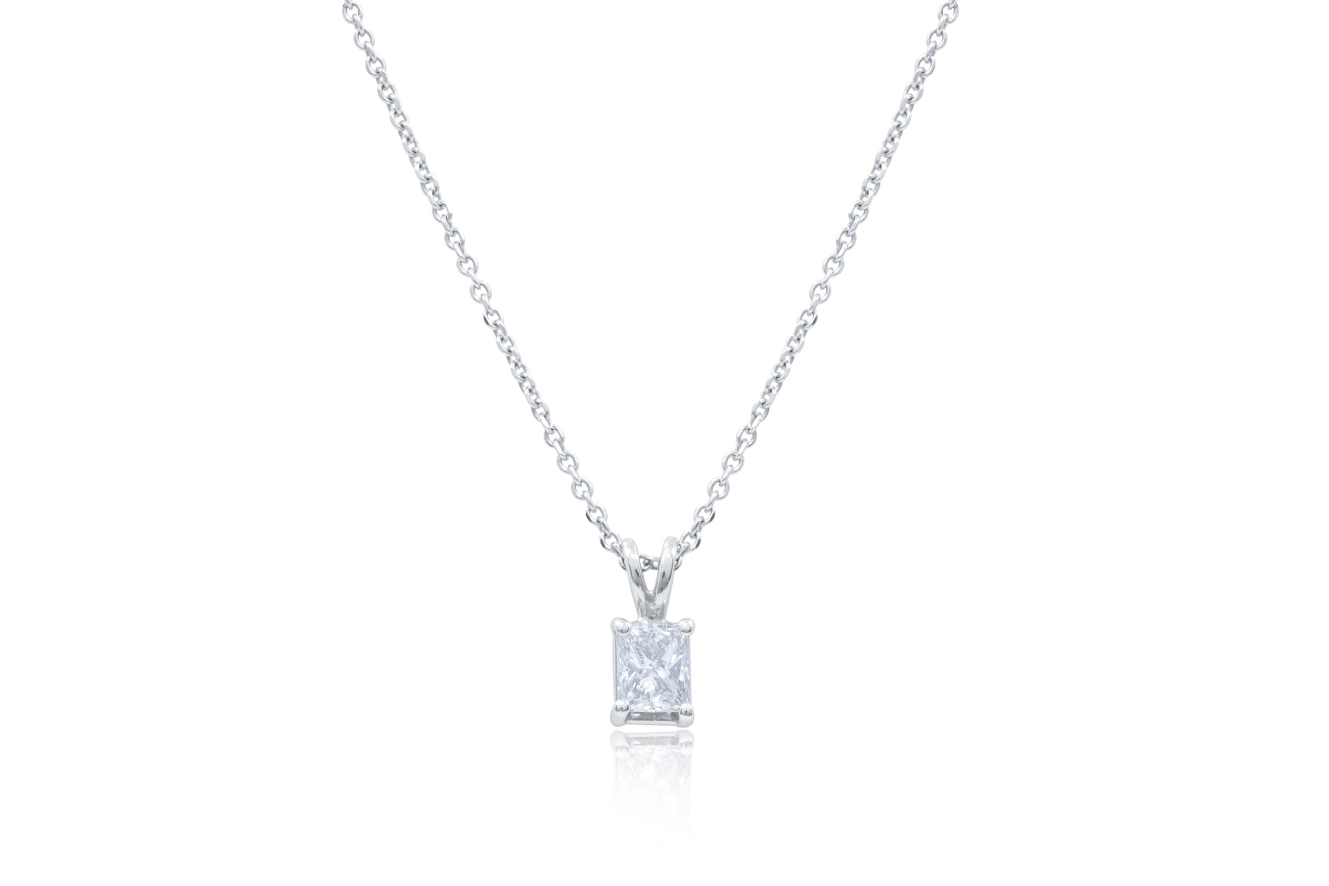 14kt white gold solitaire diamond pendant featuring 0.50 ct clarity enhanced radiant cut diamond