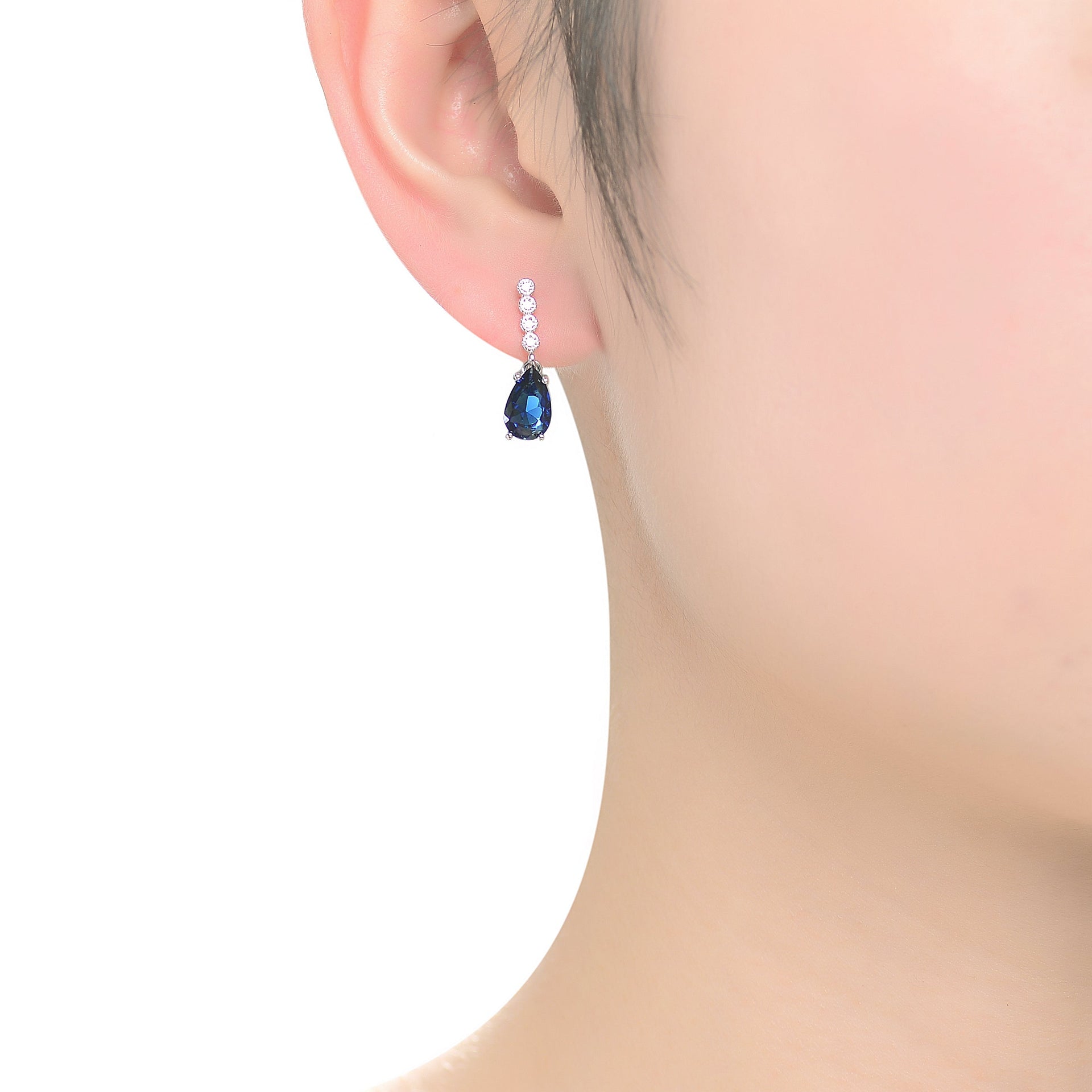 Sterling Silver Rhodium Plated With Sapphire Blue Baguette And Round Cubic Zirconia Stud Earrings