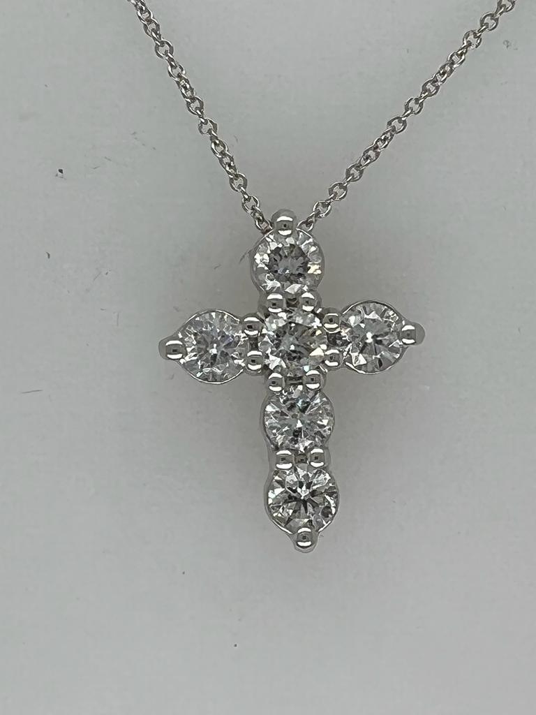 18kt white gold diamond cross pendant adorned with 1.50 cts tw of diamonds