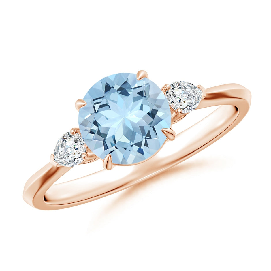 Round Aquamarine and Pear Diamond Three Stone Engagement Ring