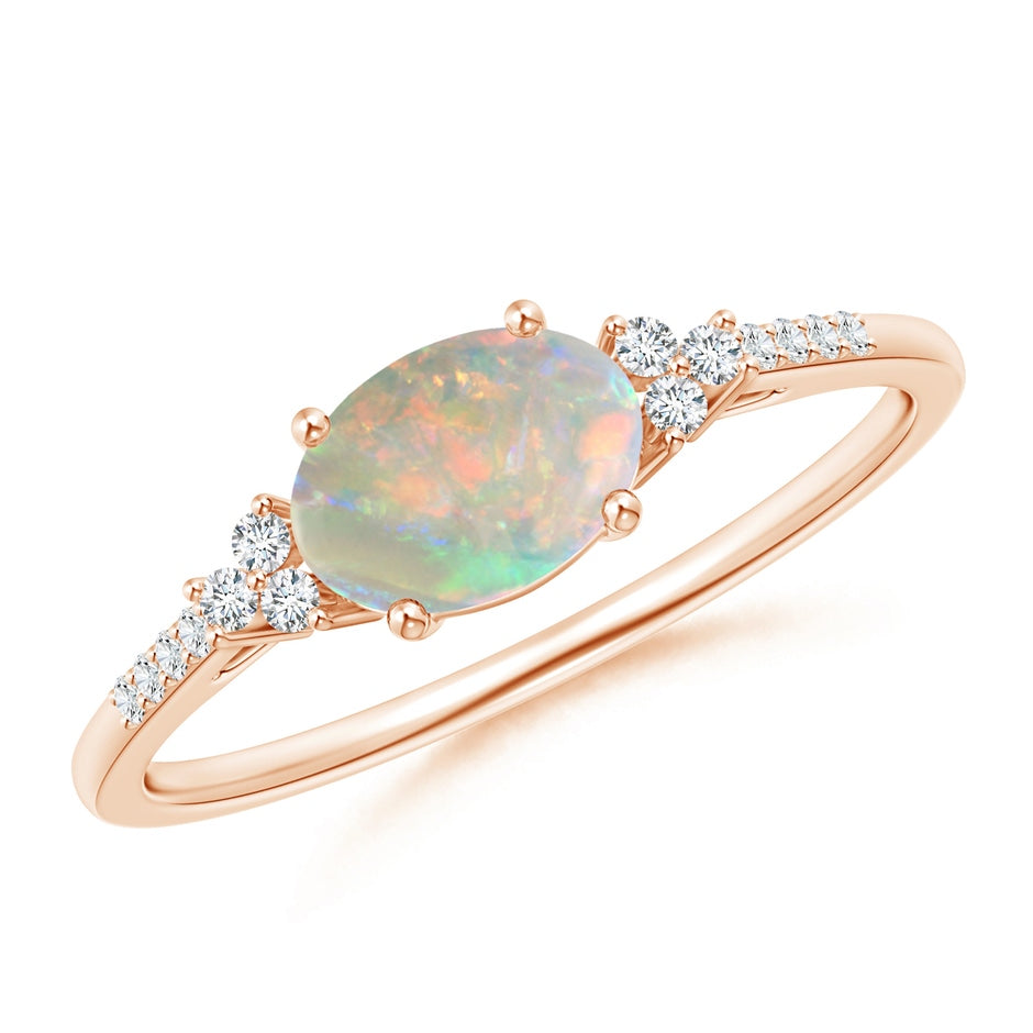 Horizontally Set Oval Opal Ring with Trio Diamonds