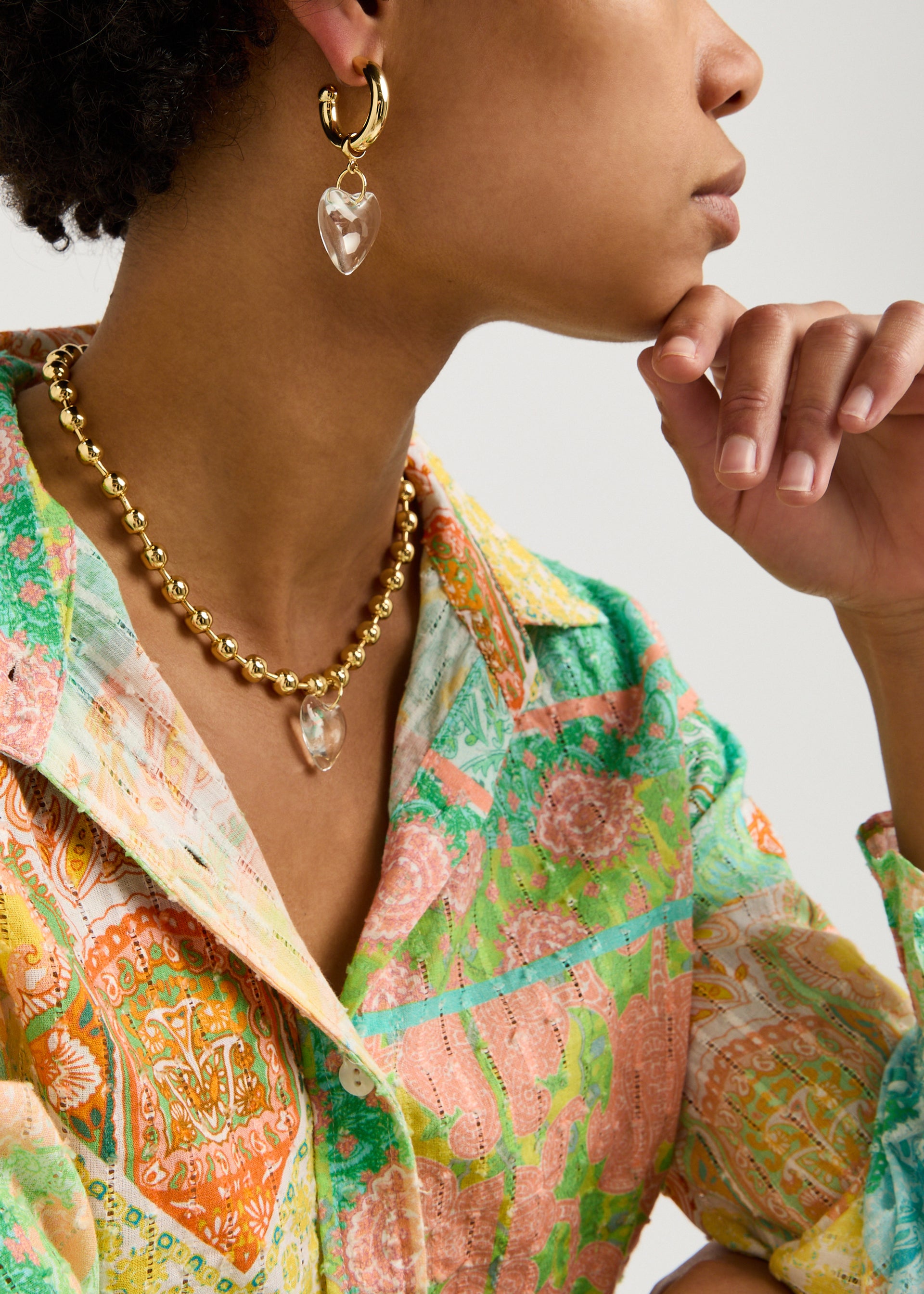 Heart-embellished hoop earrings