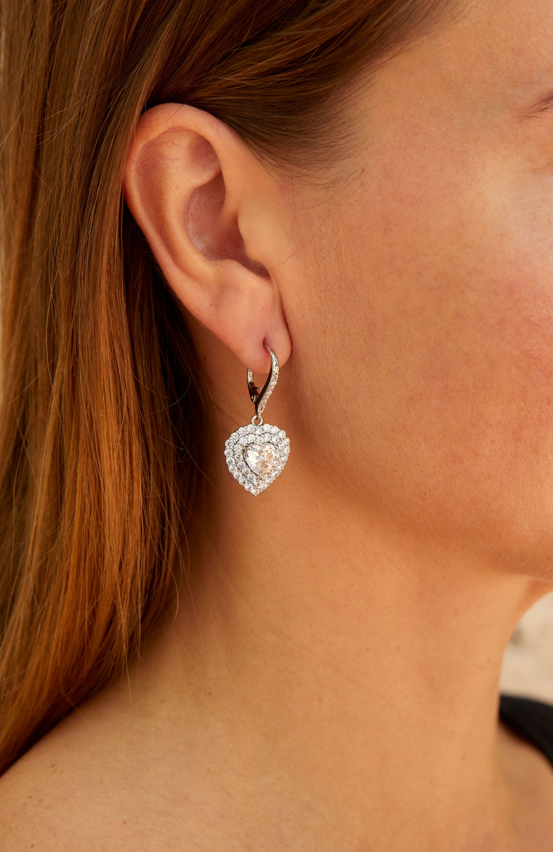 Rhod. Plated White Cz Dangle Heart Earrings