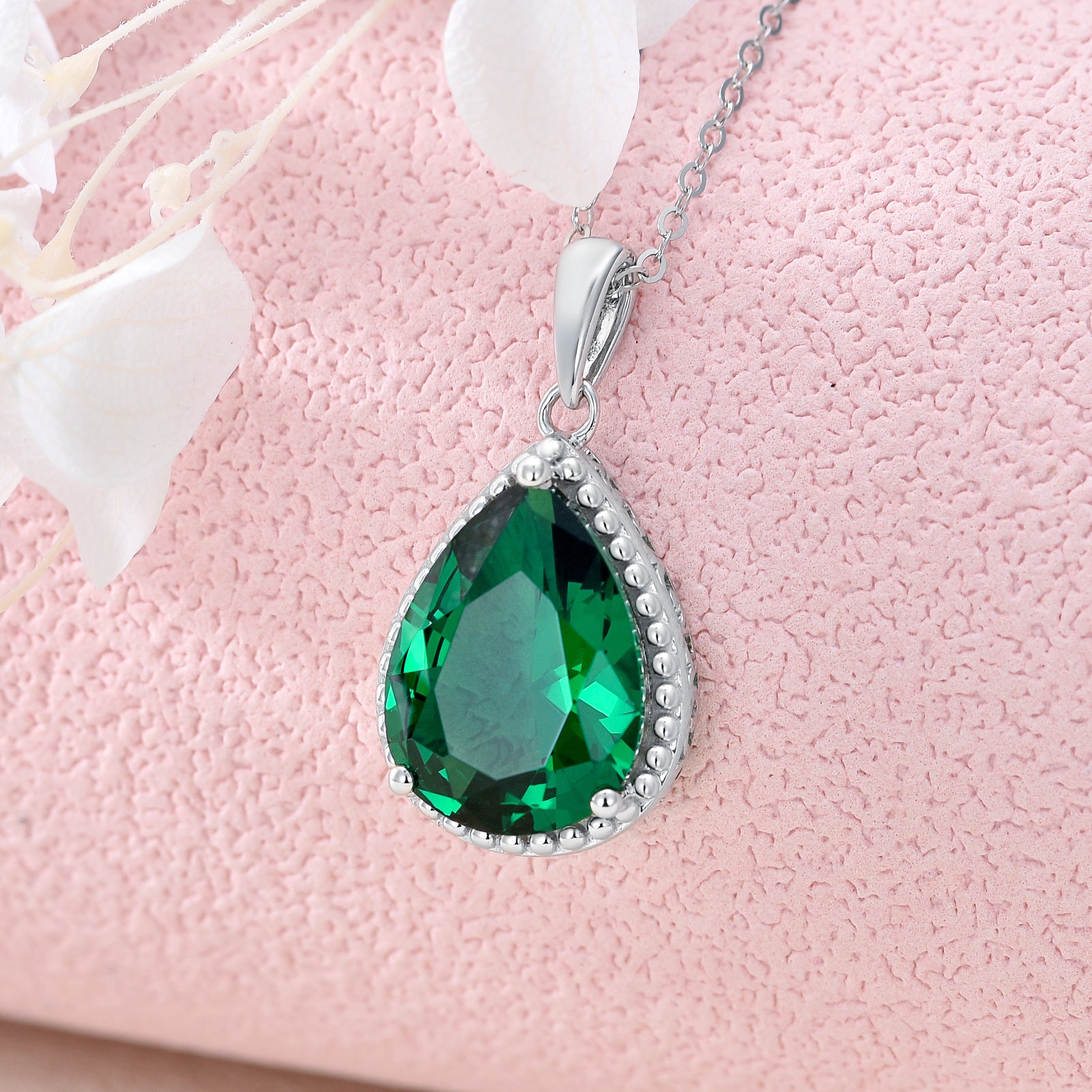 9K White Gold Pear Shaped Emerald Pendant Necklace