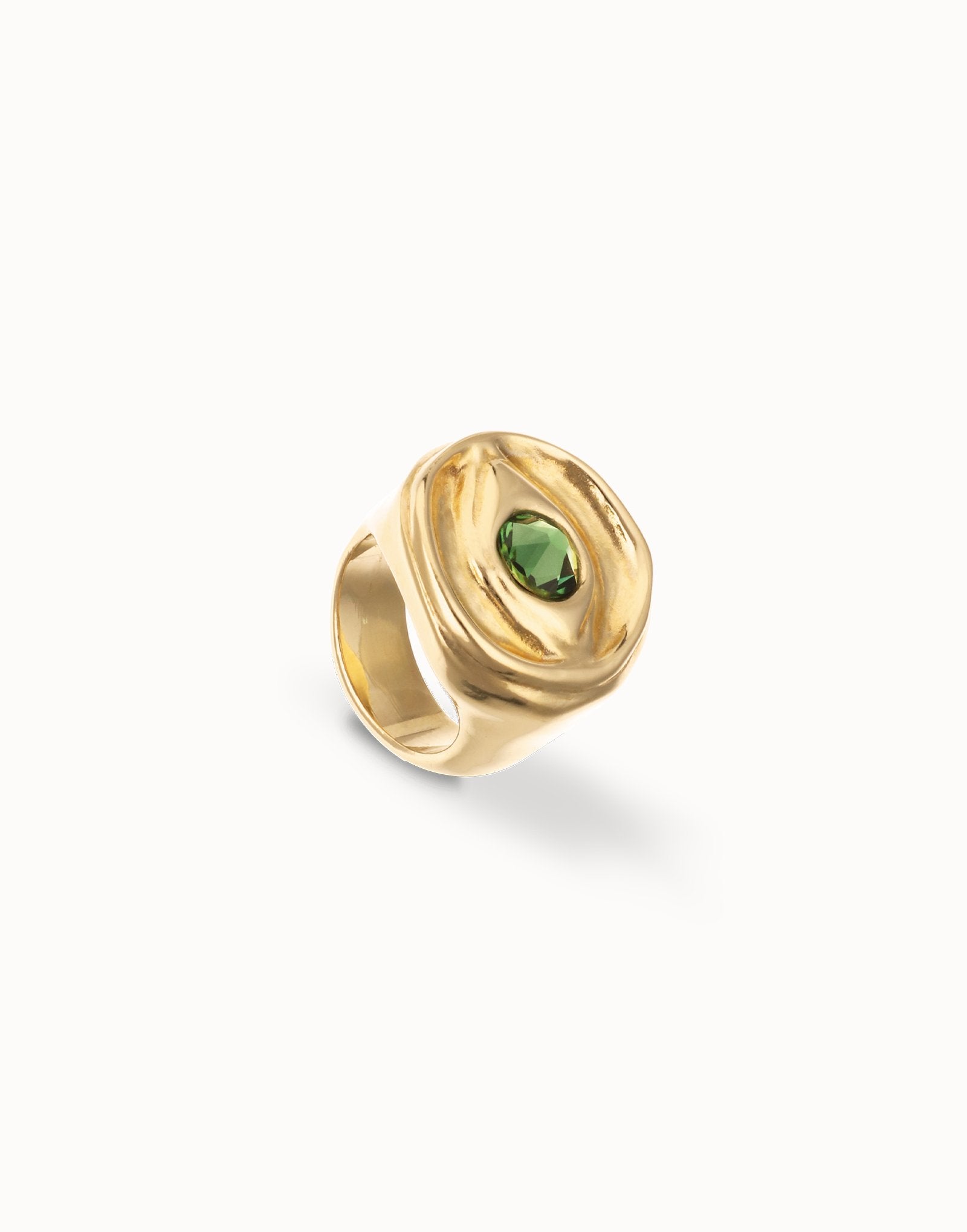Eye-shaped signet ring with faceted green crystal