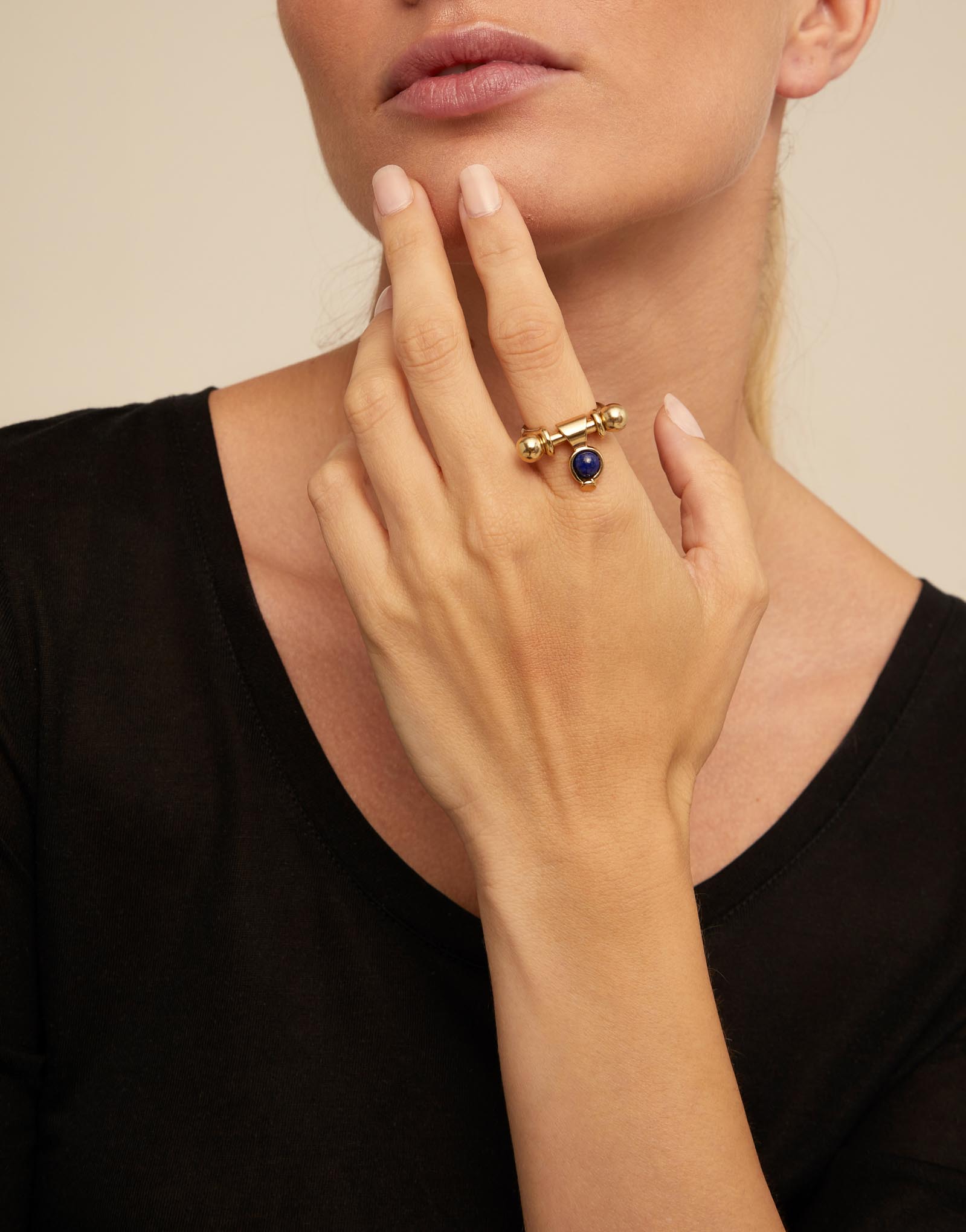 Charm with blue stone