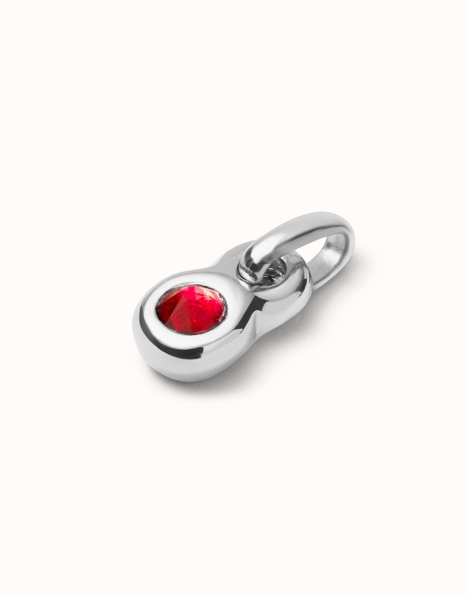 Charm with red crystal