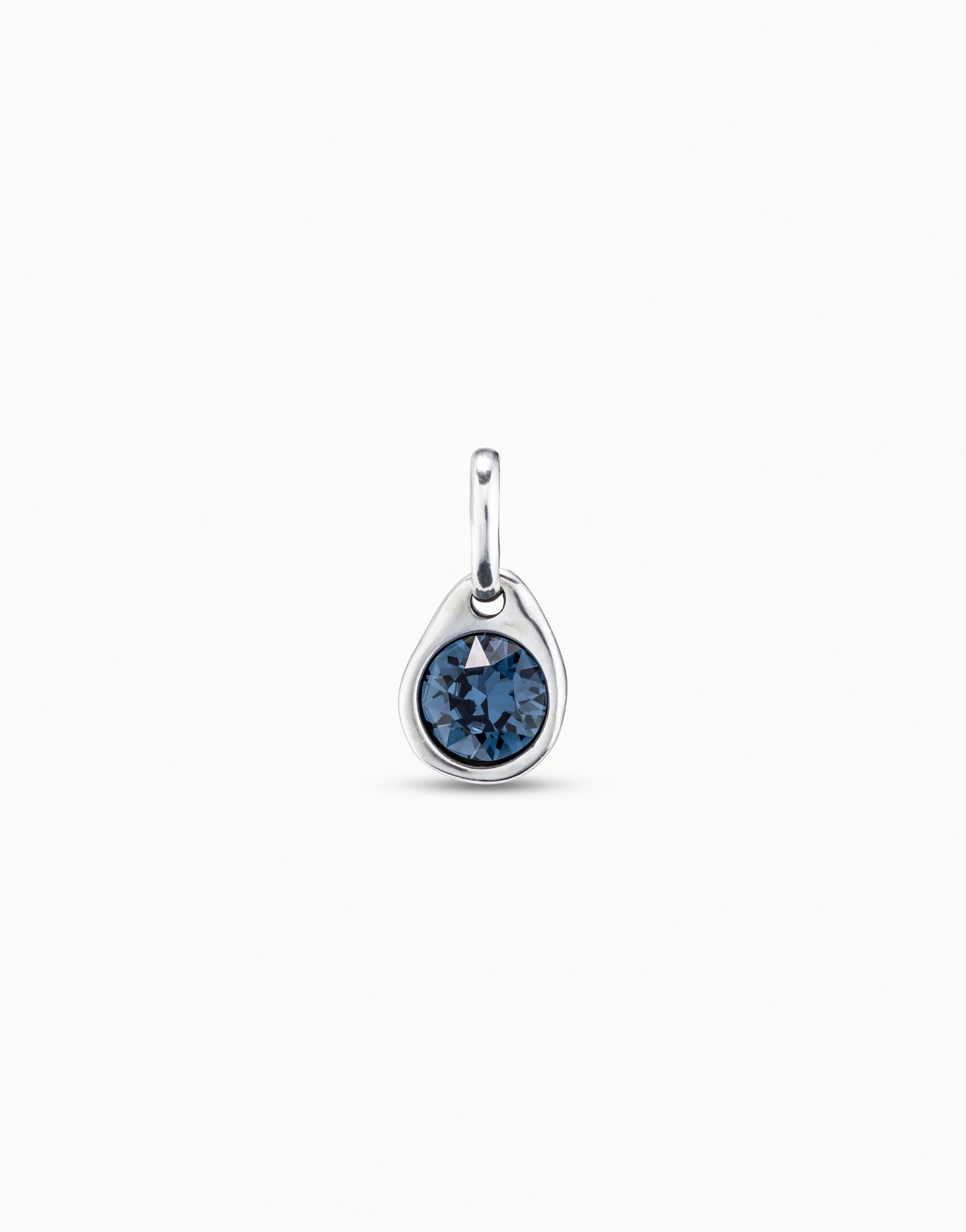 Circular charm with crystal