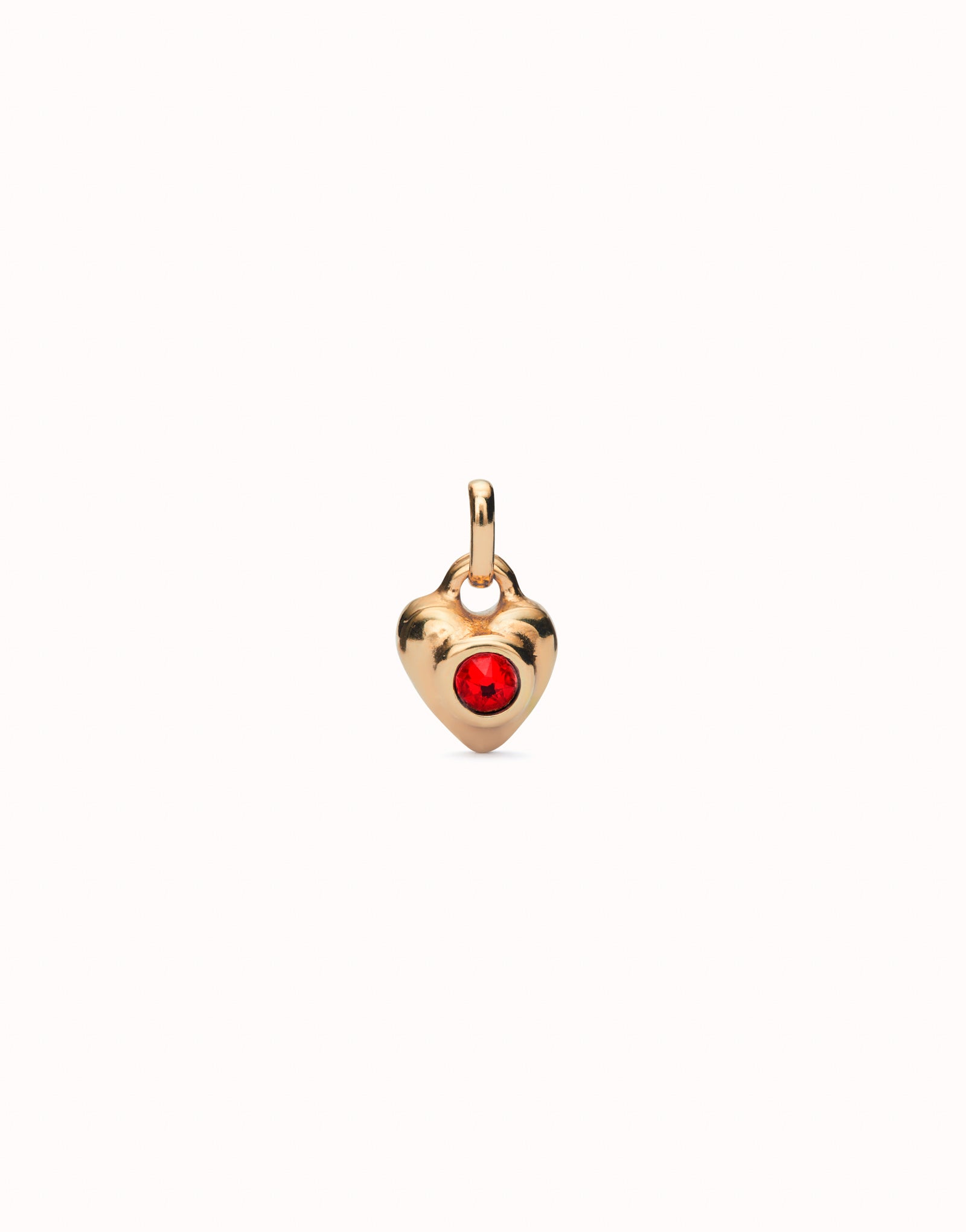 Charm with red crystal