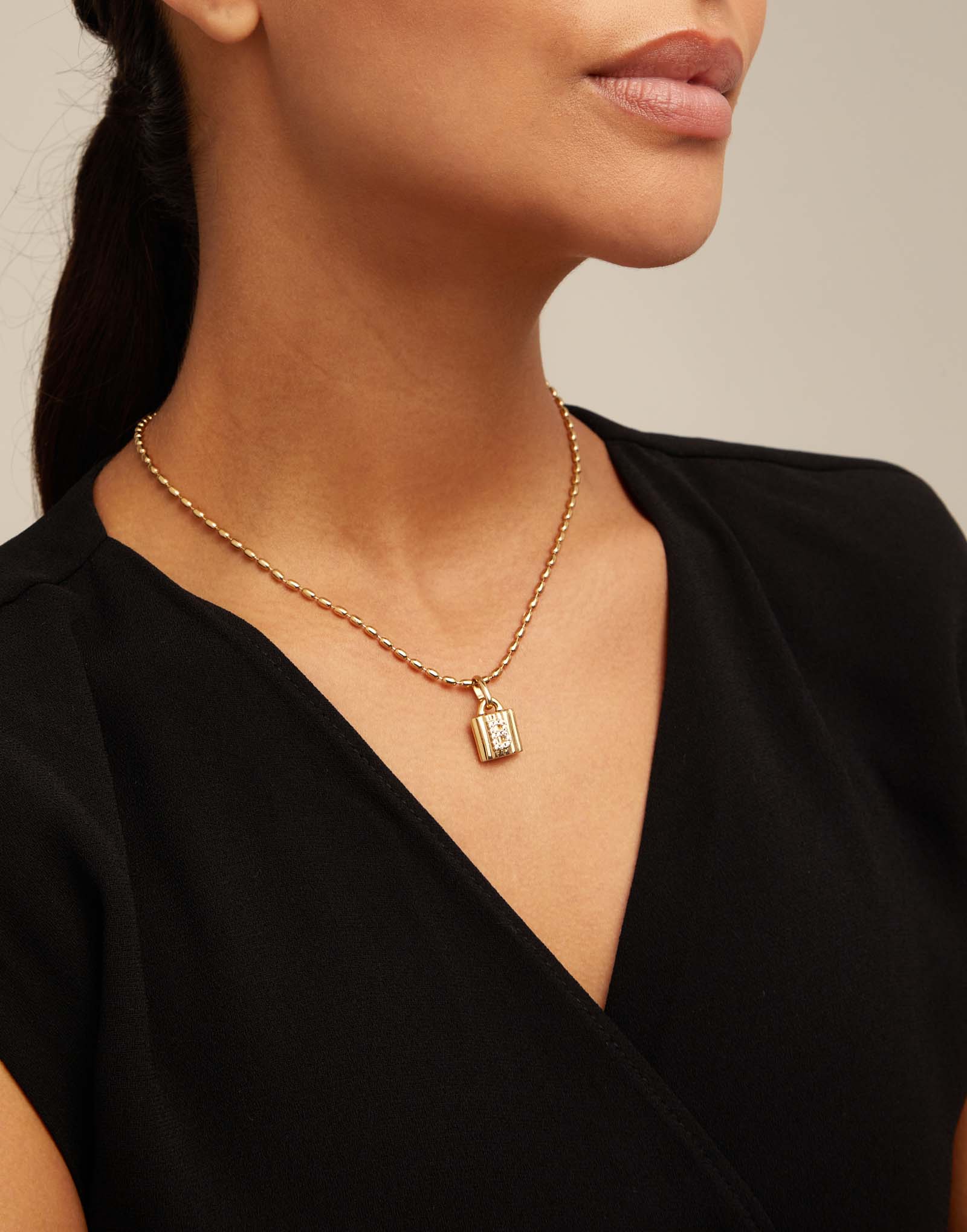 18K gold-plated padlock charm with topaz letter B