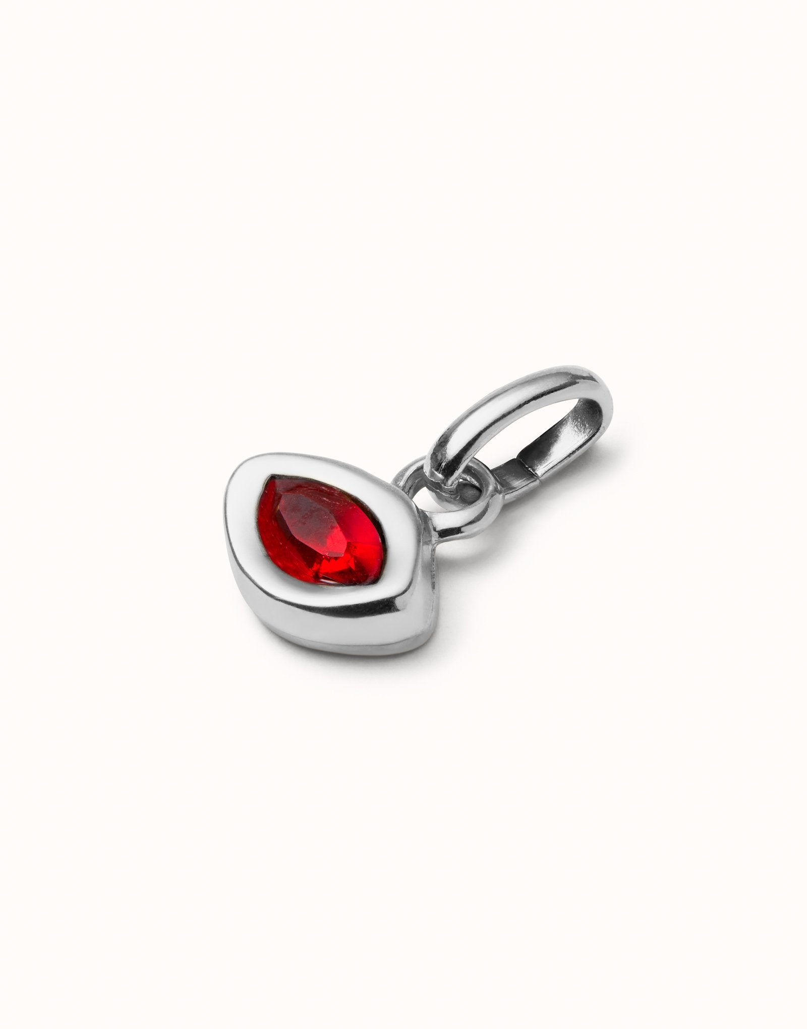 Charm with red crystal